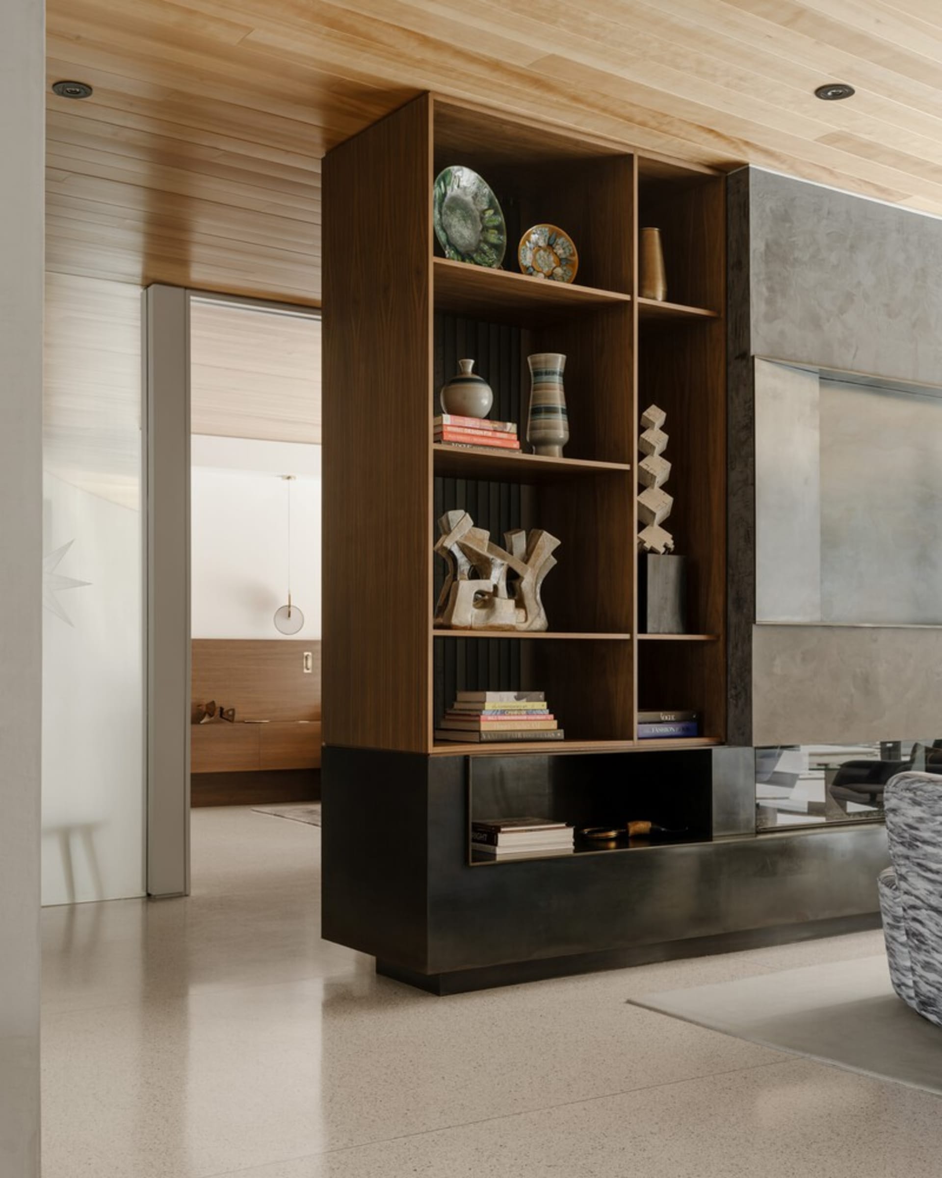 Modern living room featuring wood and metal elements in a contemporary design.