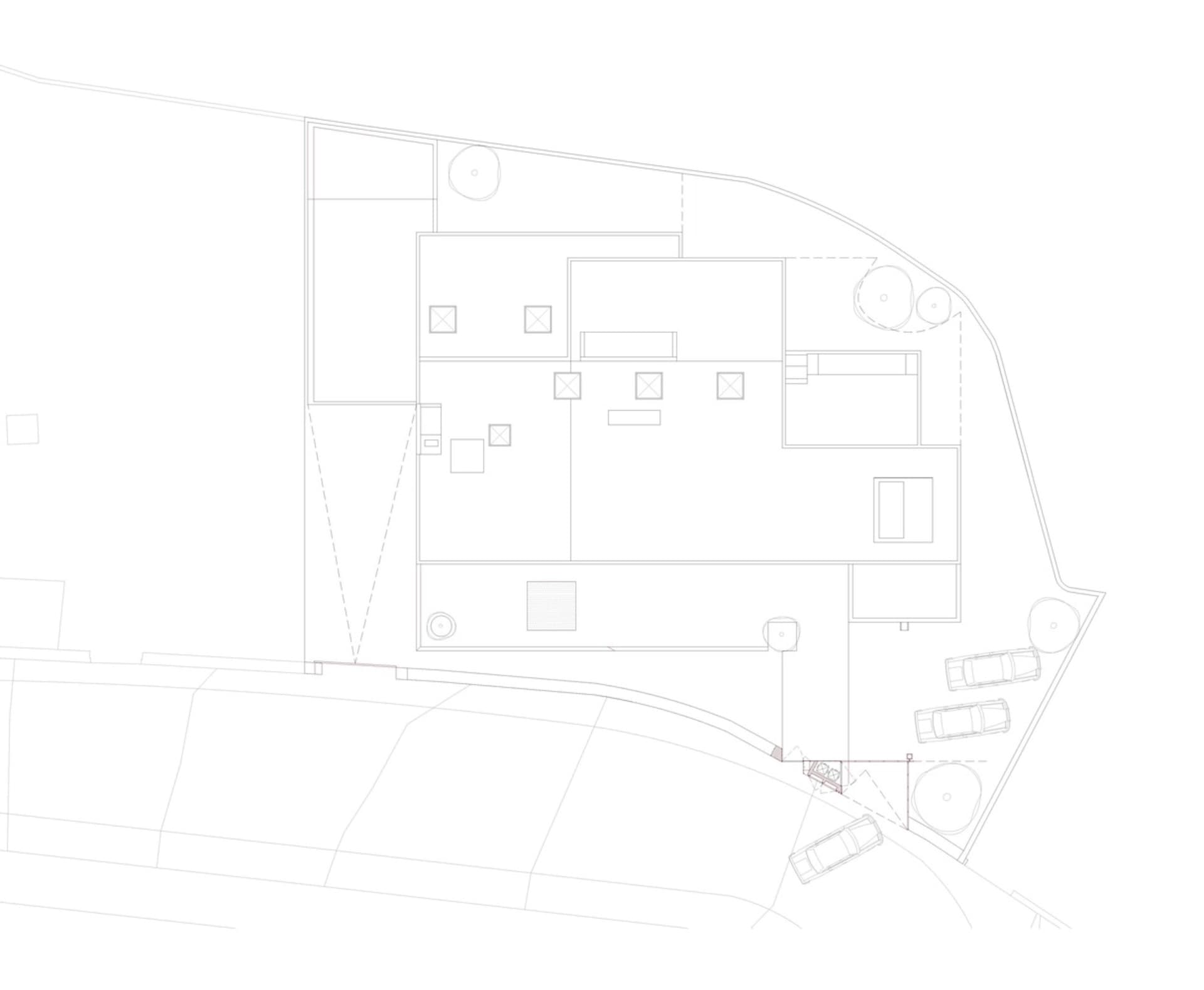A detailed 2D architectural drawing of a modern office layout, showcasing open-plan spaces and functional zones.