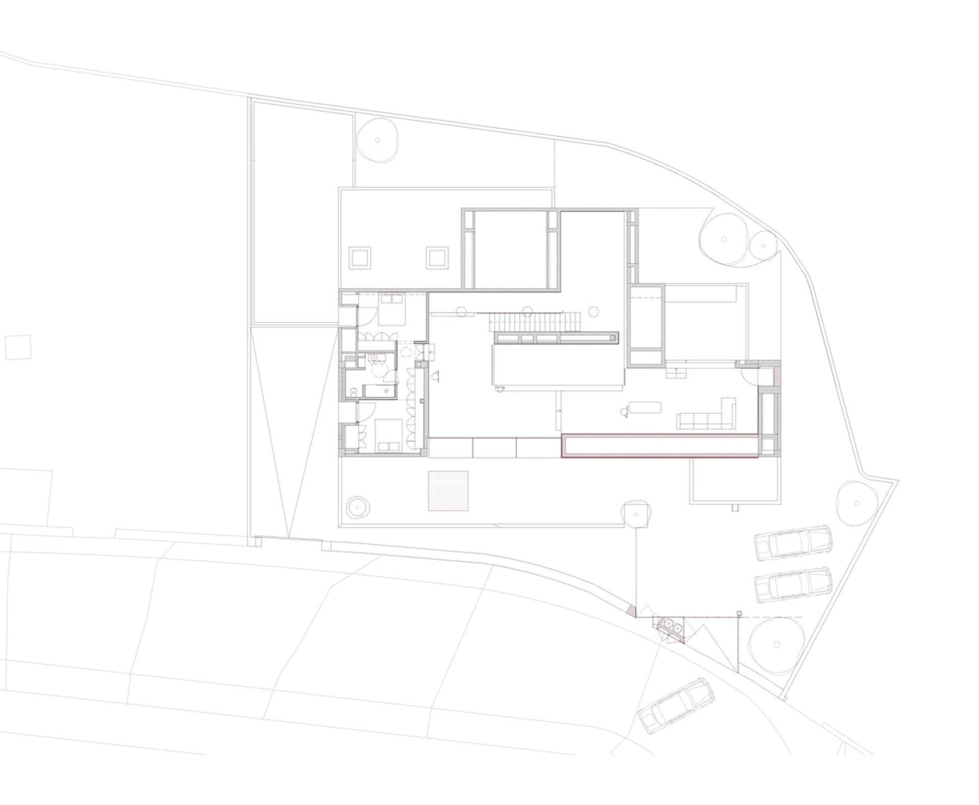 A detailed 2D architectural drawing of a residential floor plan, showcasing modern design elements and layout.