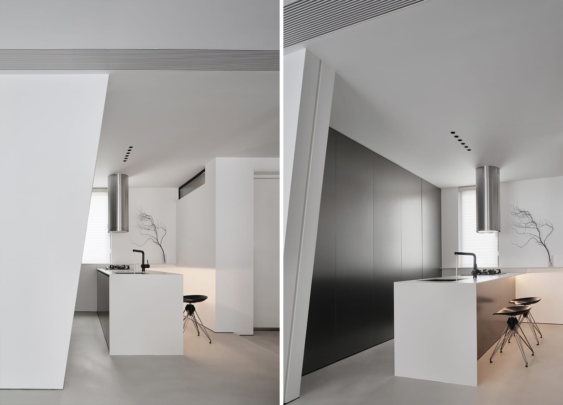 Modern minimalist kitchen with white and black color scheme, metallic accents, and a sleek design.