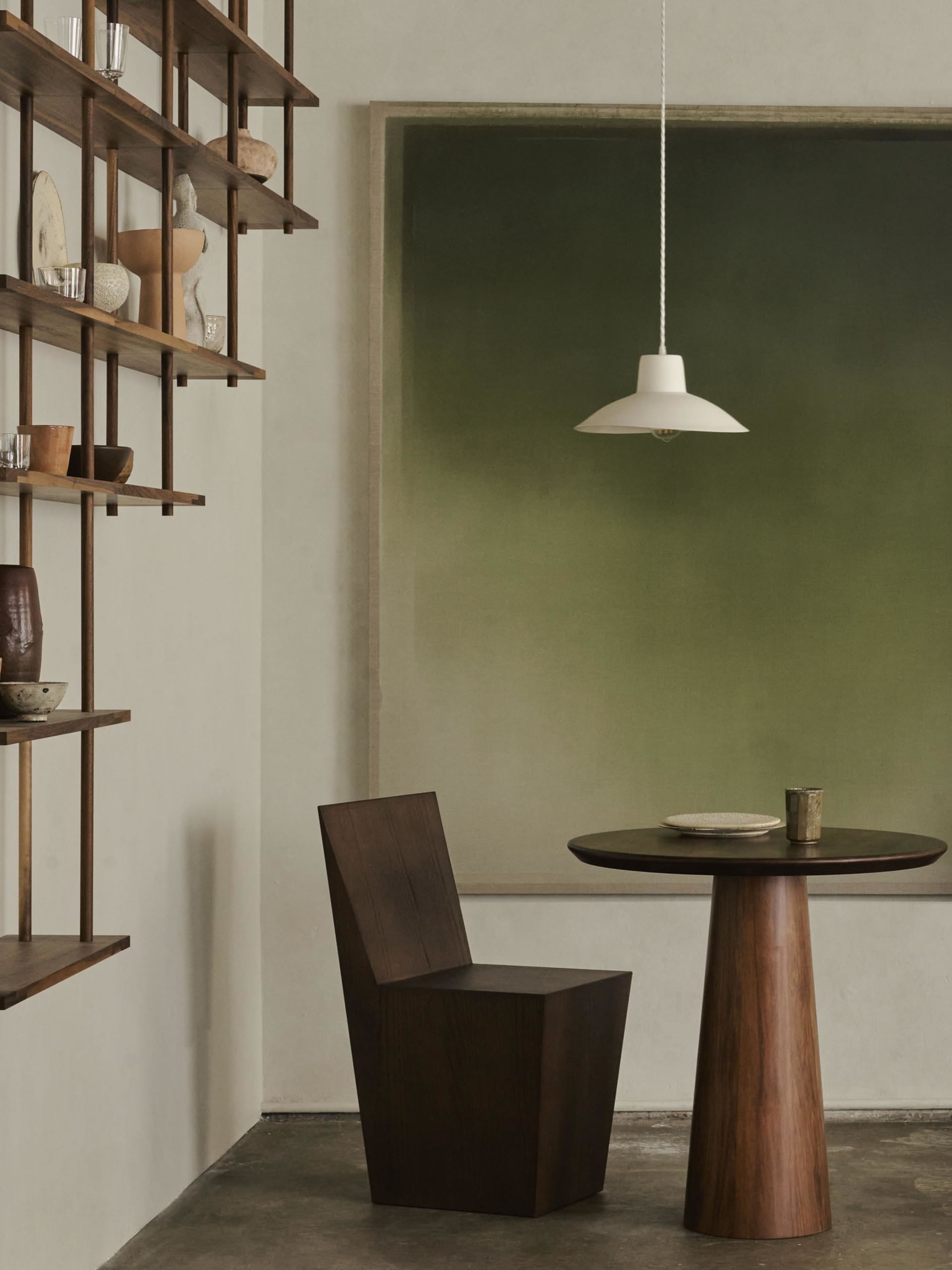 Modern furniture setting featuring wooden elements and geometric shapes.