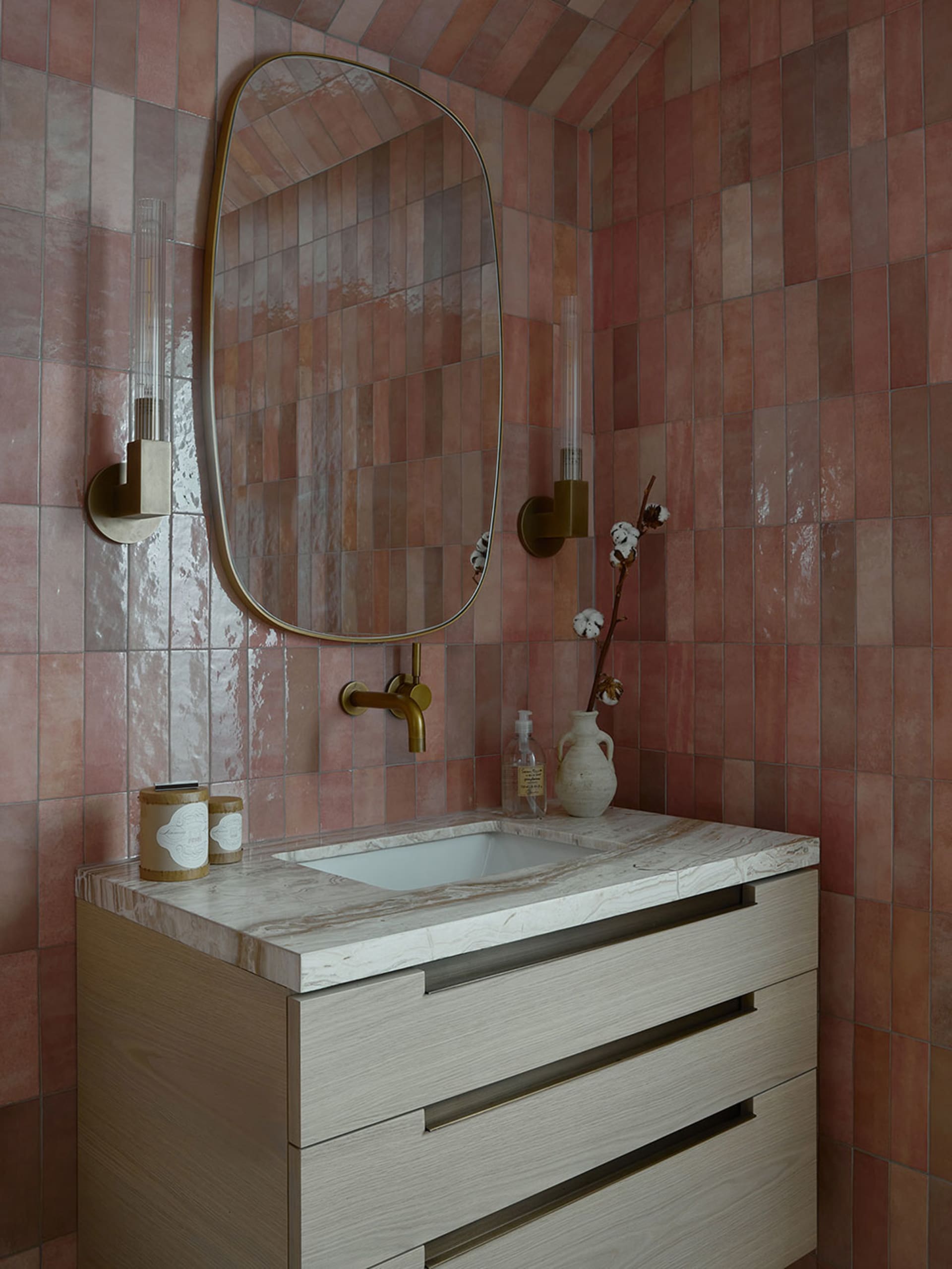 Modern bathroom with ceramic tiles, mixed media design, and minimalist styling.
