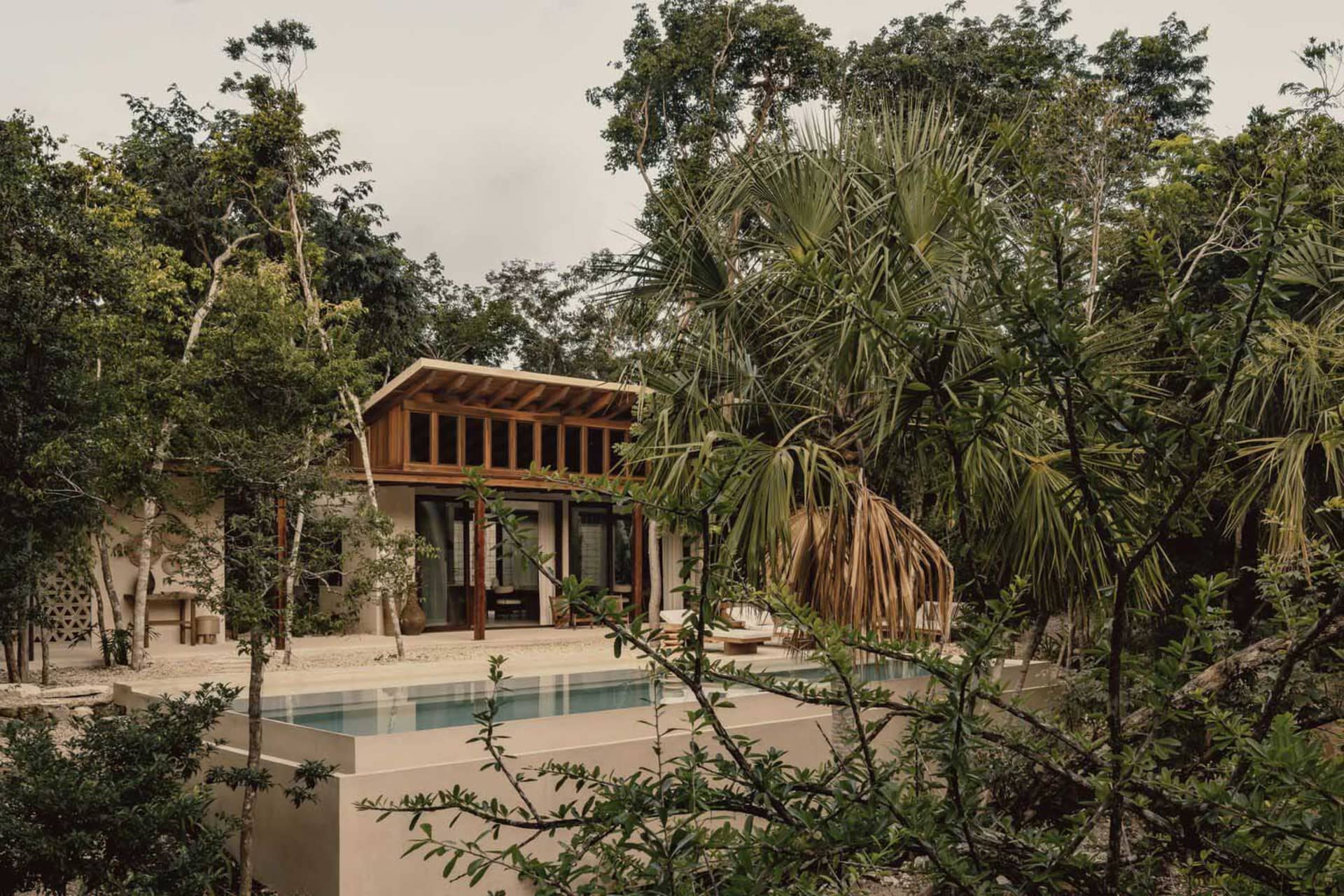Modern residential exterior featuring wooden materials.
