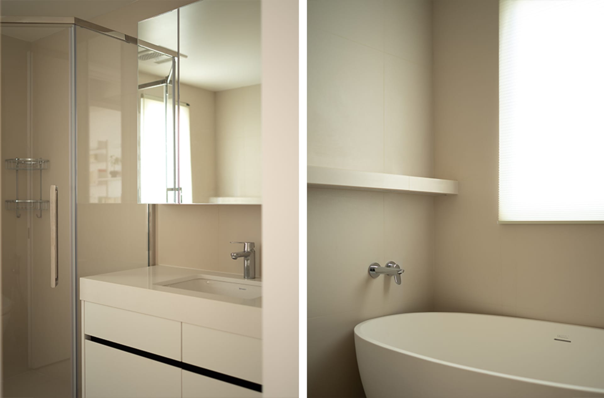 Minimalist bathroom with white ceramic sink, glass shower, and metal faucet.