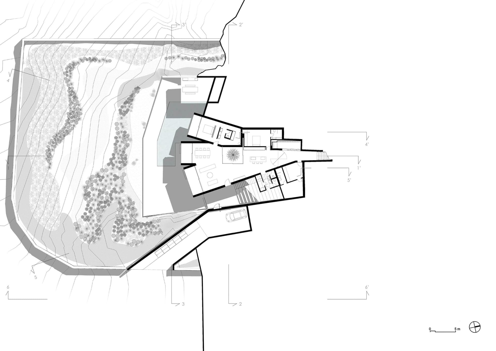 現代住宅建築樓層平面圖，採用混凝土、玻璃和金屬材料。