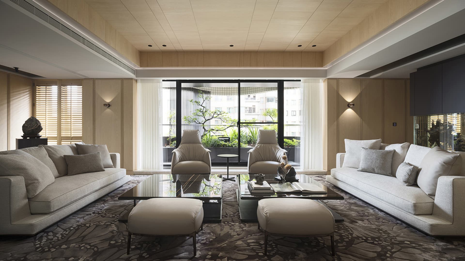 A well-designed contemporary living room featuring modern sofas with plush cushions.
