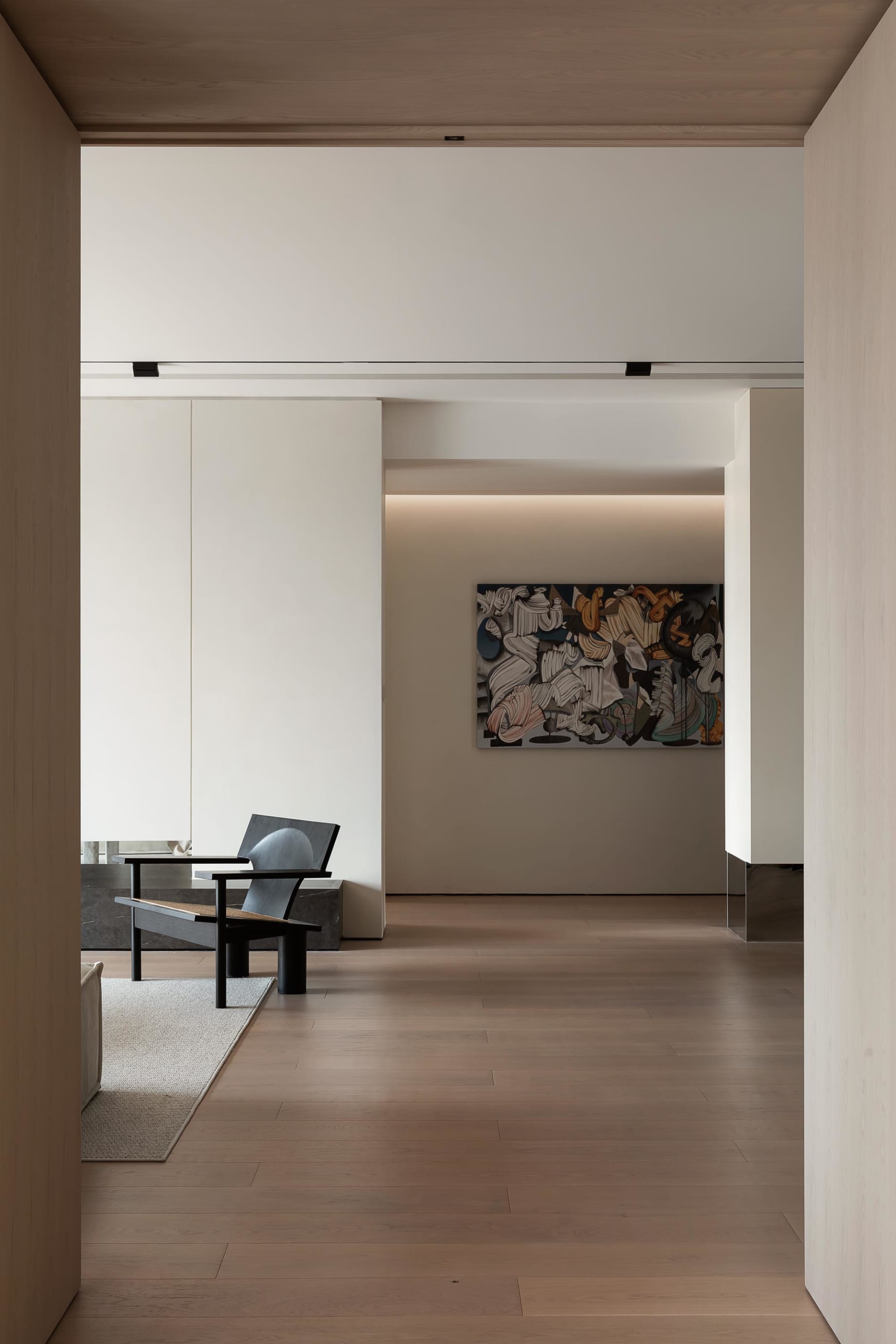 A minimalist desk in a modern interior design setting.