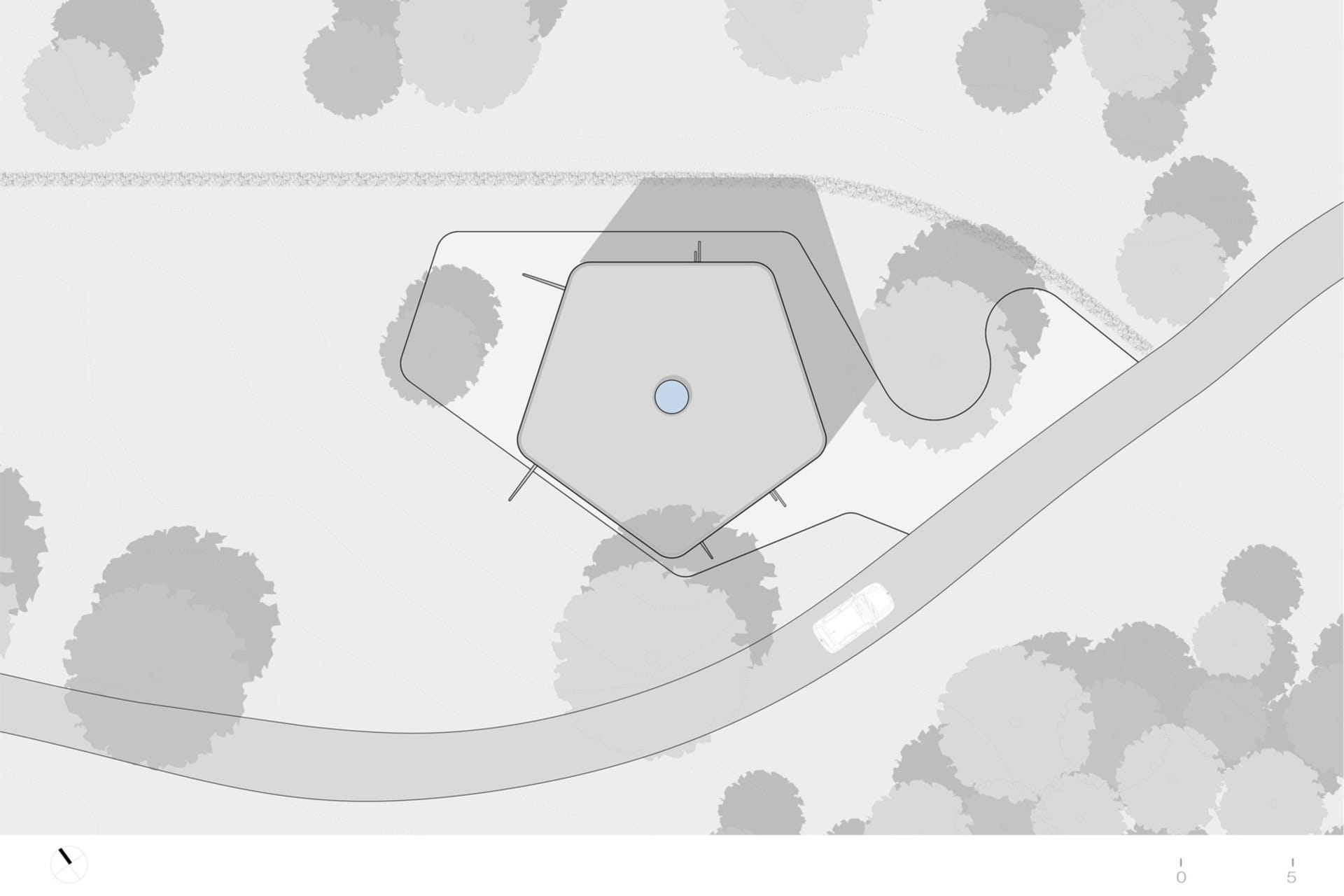 A minimalist, contemporary building with geometric shapes on a site plan.