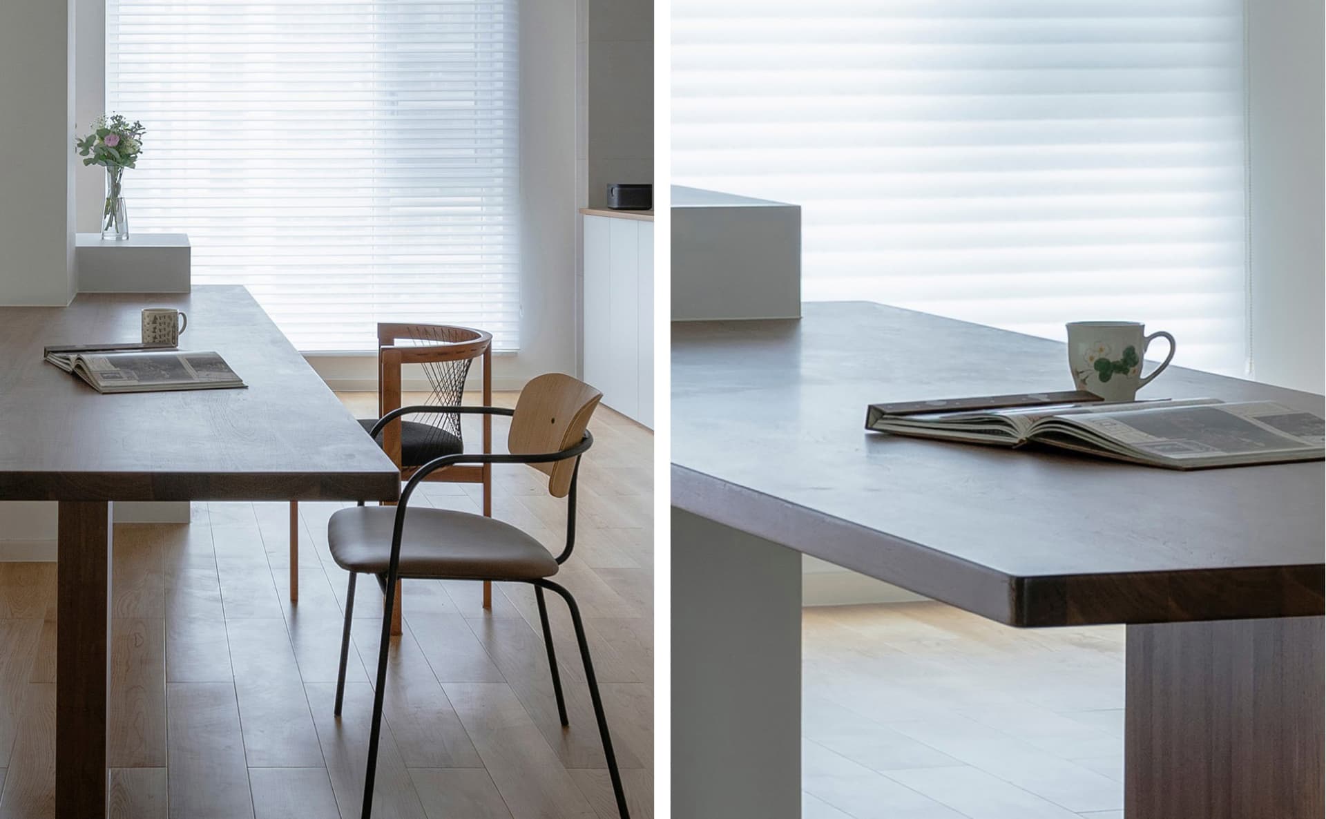 Modern minimalist dining room featuring a long wooden dining table with a concrete countertop, minimalistic furniture, and a