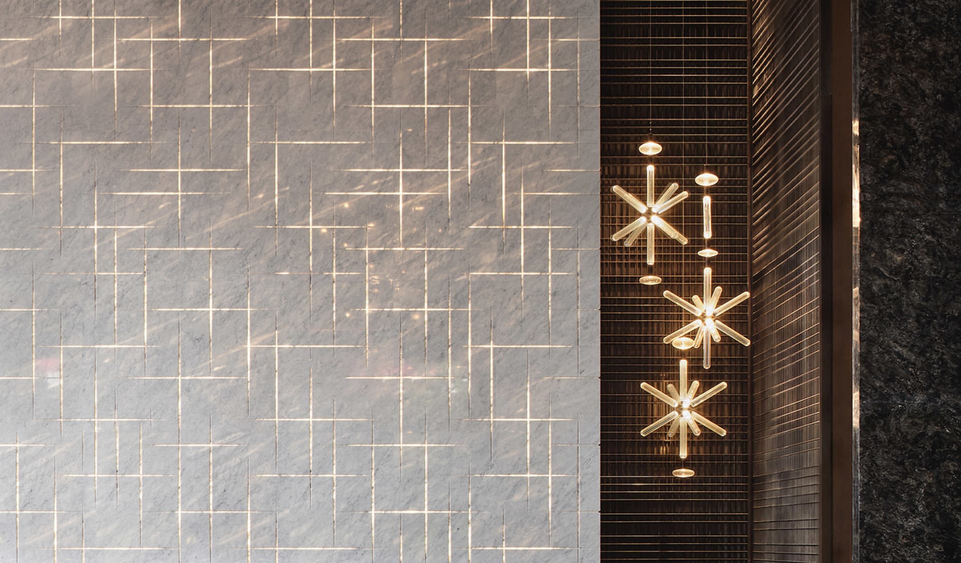 A modern interior design featuring glass and geometric patterns.