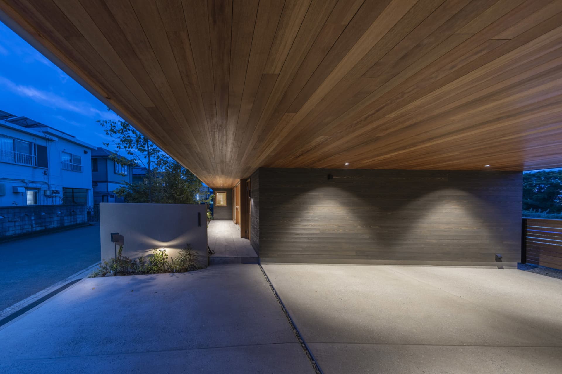 A modern wooden exterior featuring a clean, minimalist design.