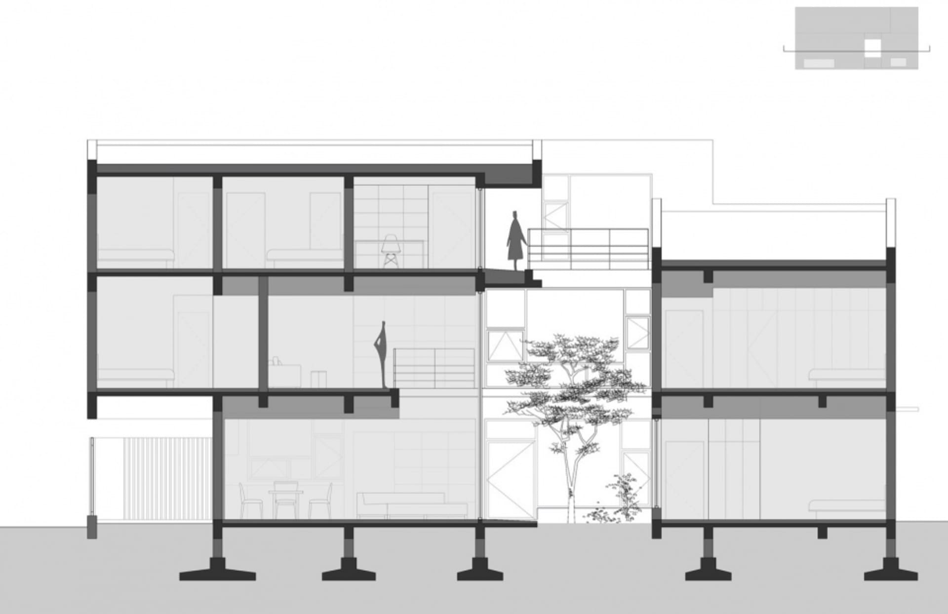 Industrial building with materials and platforms represented in a technical drawing.