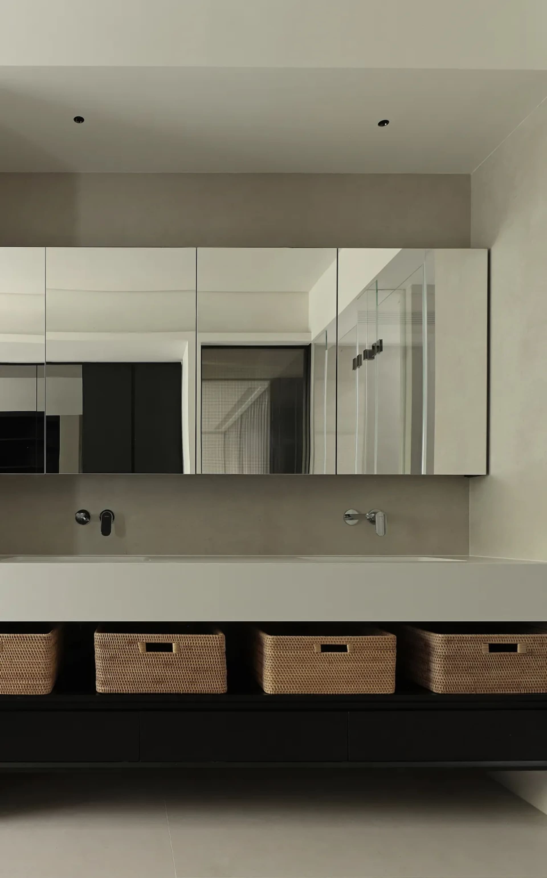 Modern bathroom featuring polished concrete floor and minimalist design