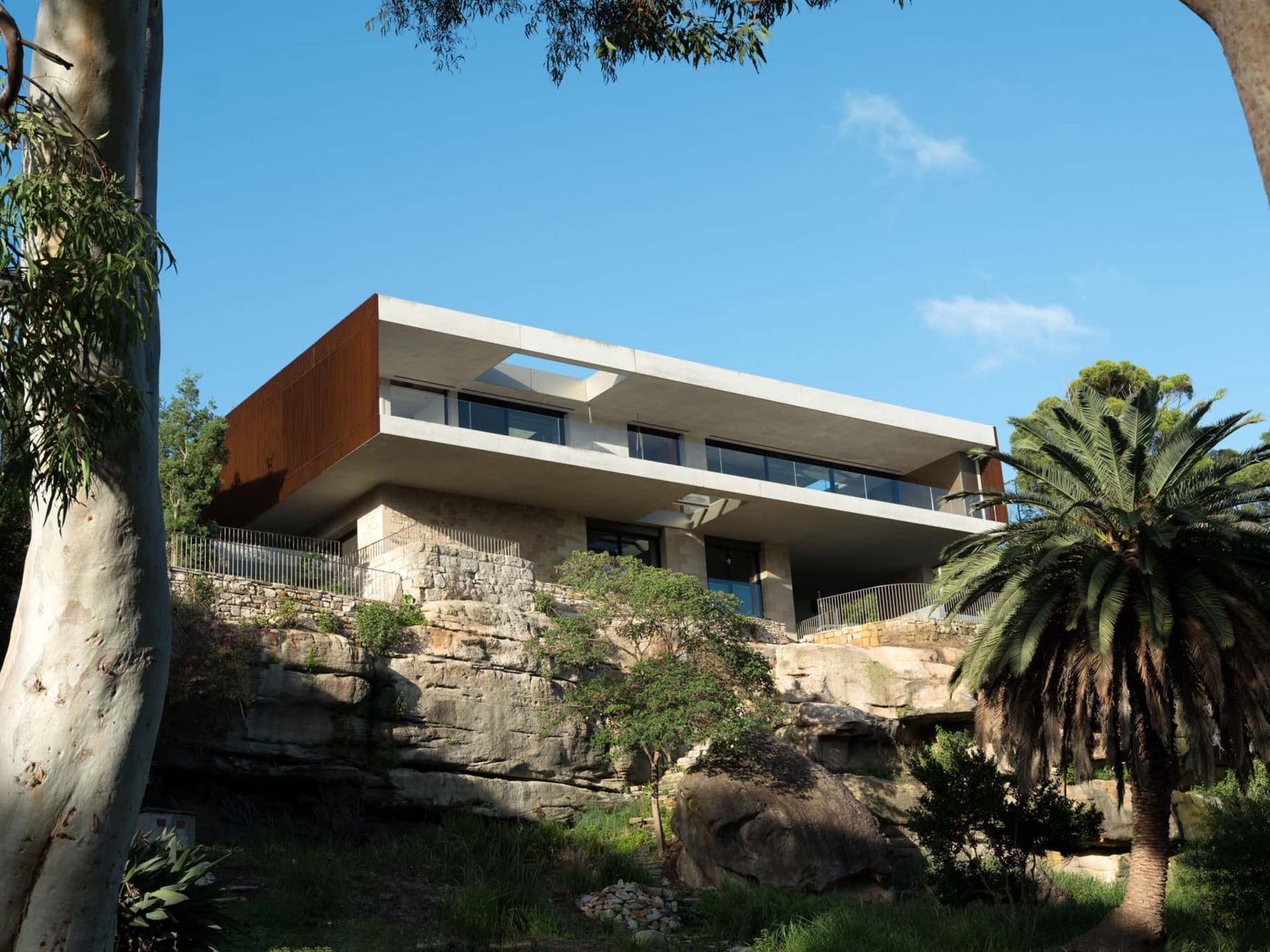Modern residential house featuring concrete and glass materials