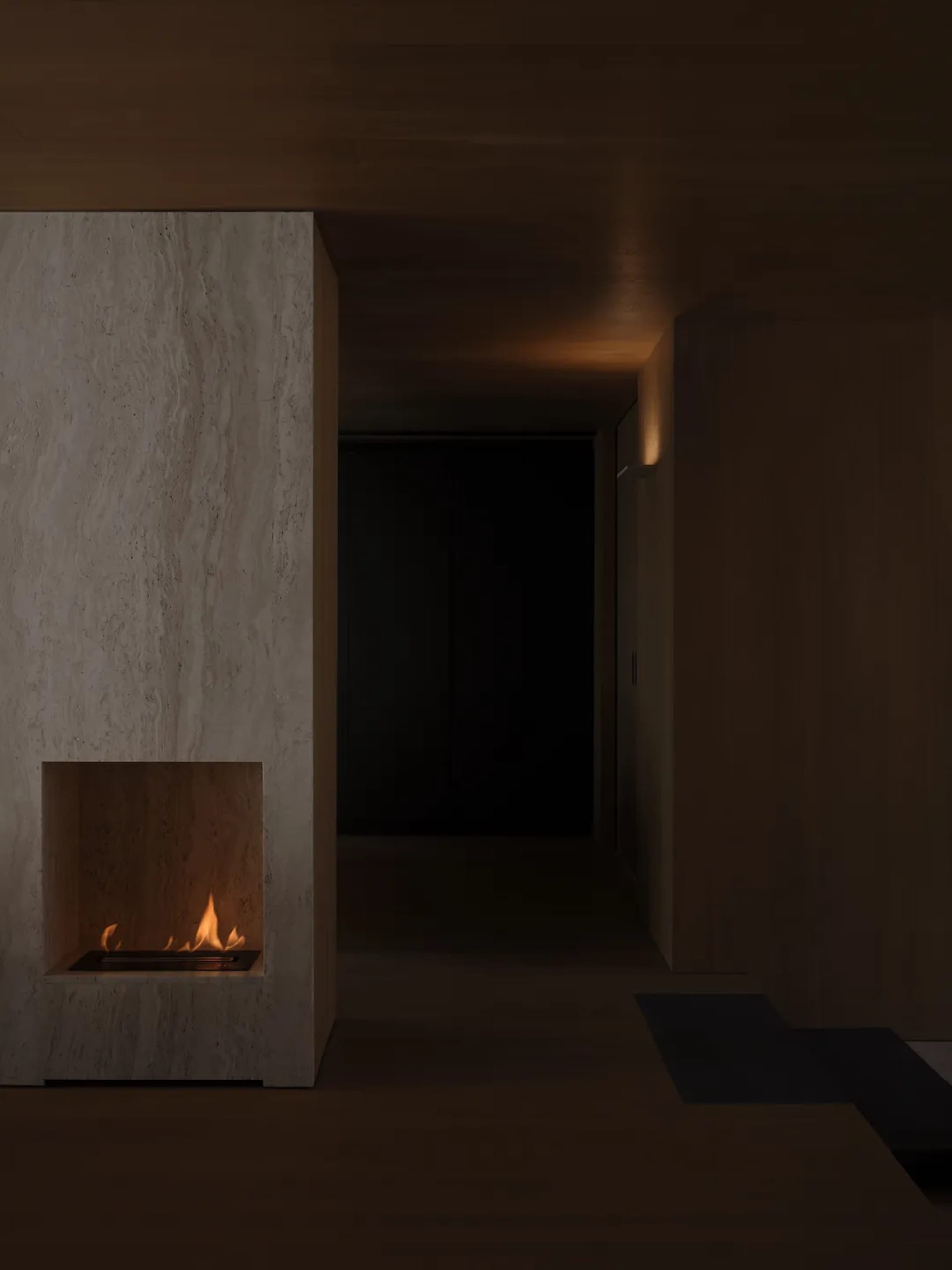 Minimalist living room with wooden walls and a fireplace.