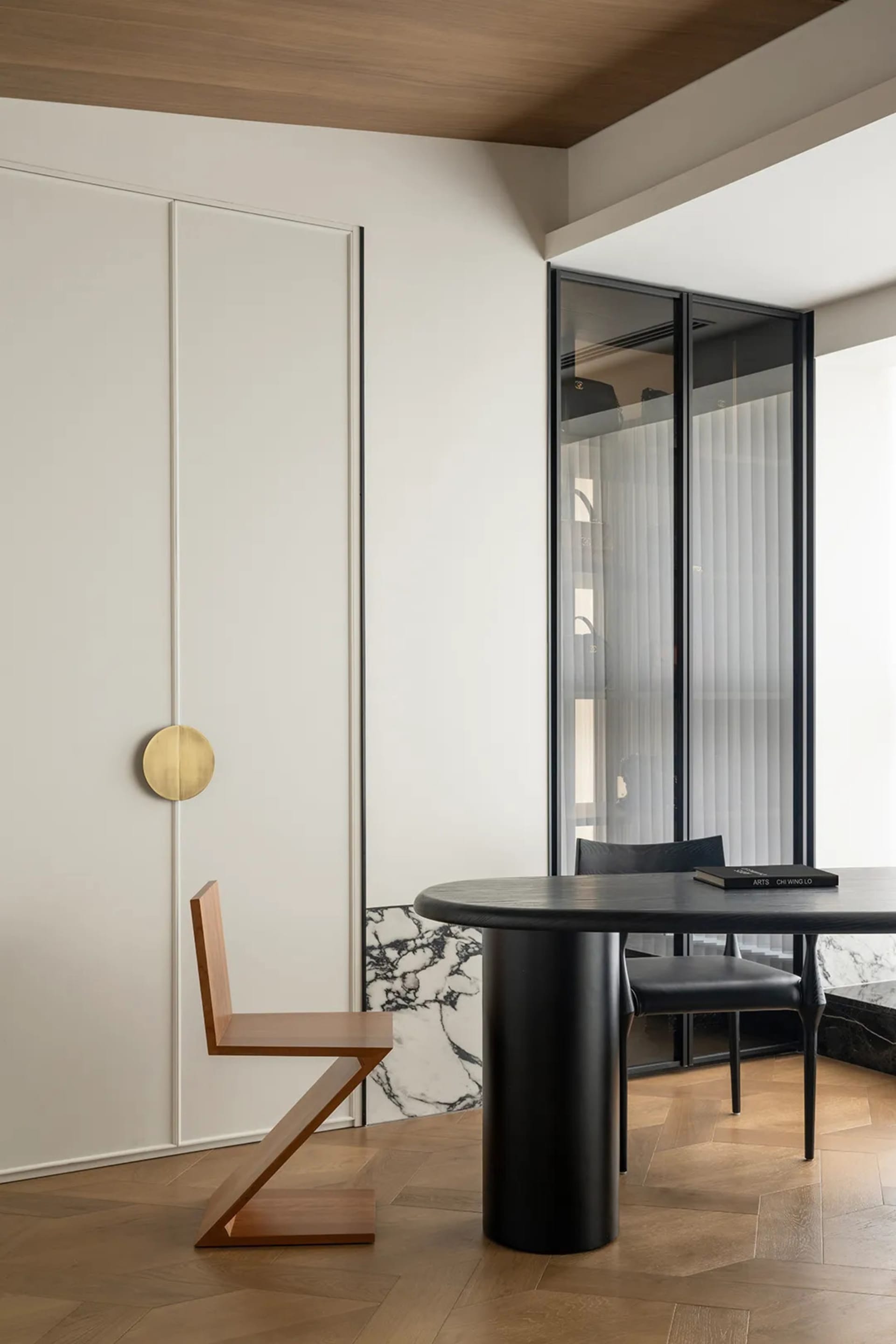A modern living room featuring wood and concrete elements.