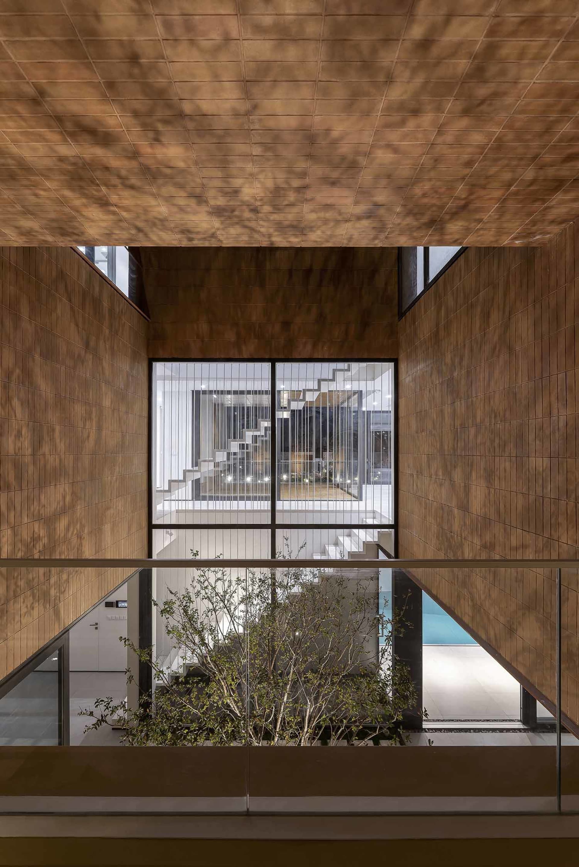Modern interior space featuring contemporary design with wood materials.