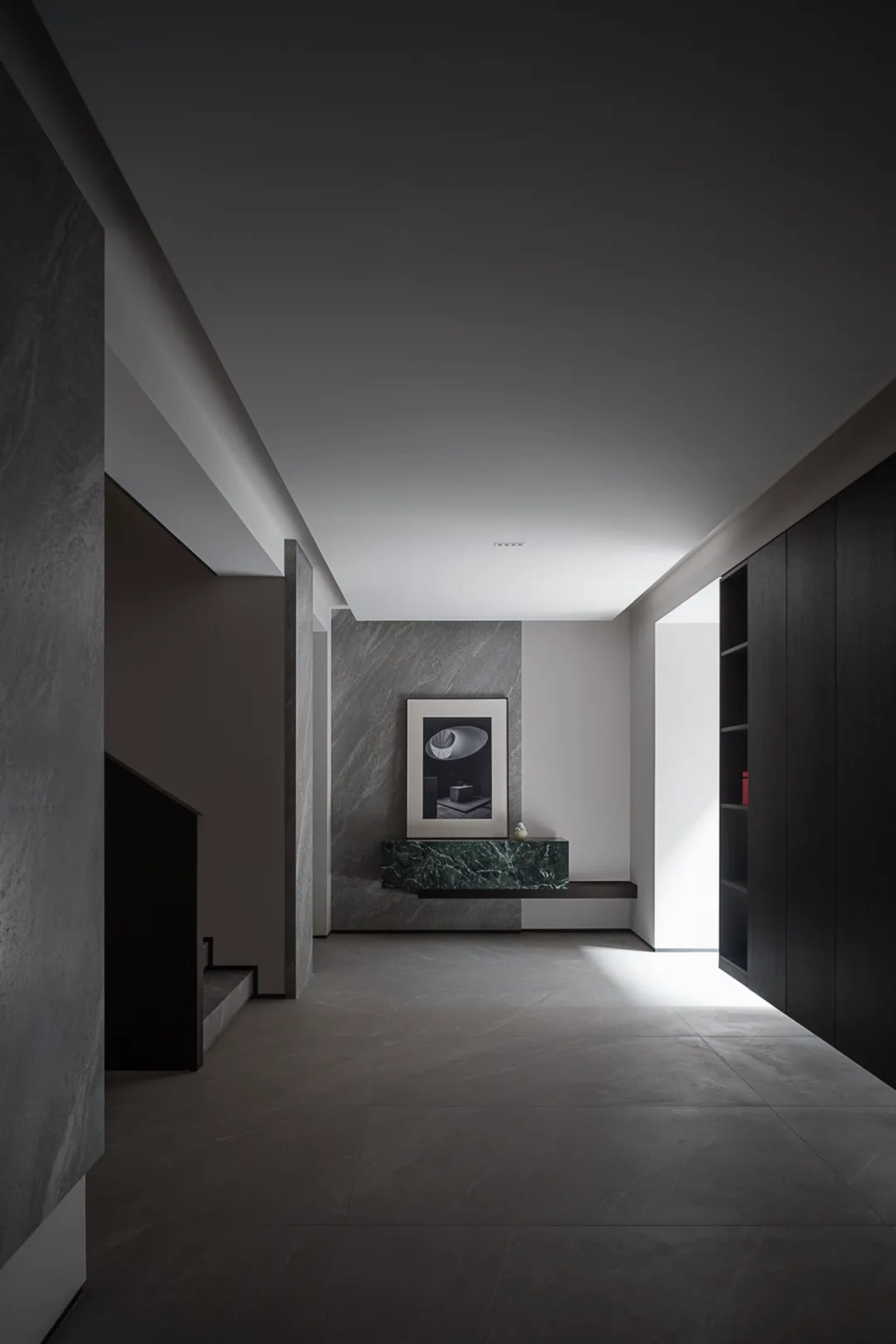 A modern living room featuring marble elements.