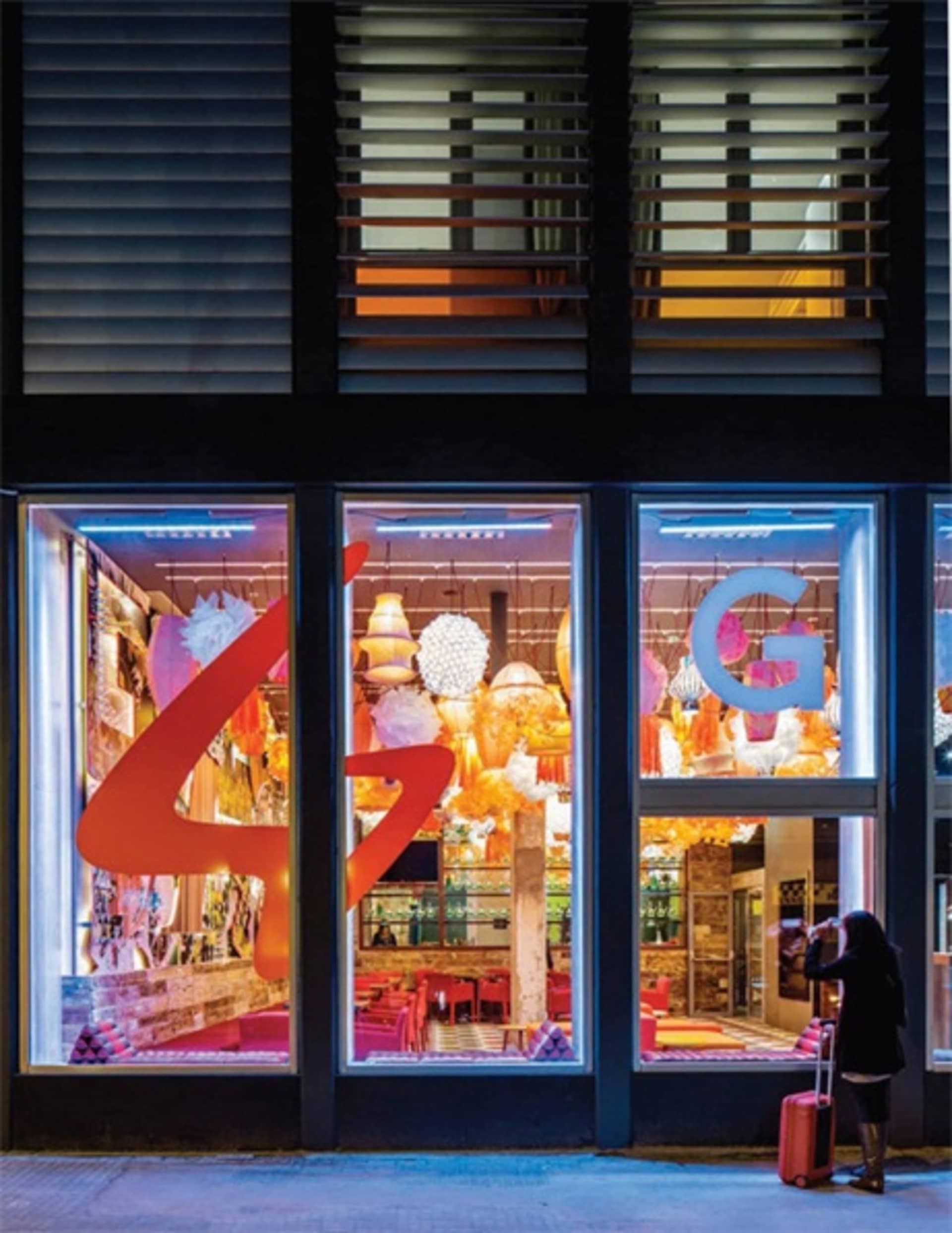 A retail storefront display featuring industrial-style lighting and decor.