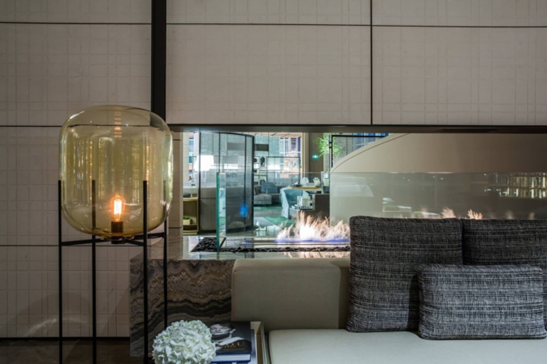 Modern lobby interior featuring a glass feature wall.