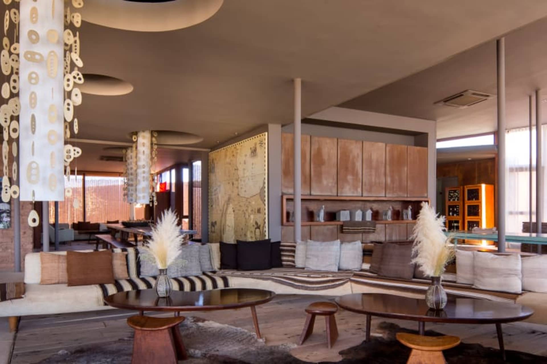 Modern lobby featuring wood and leather furniture