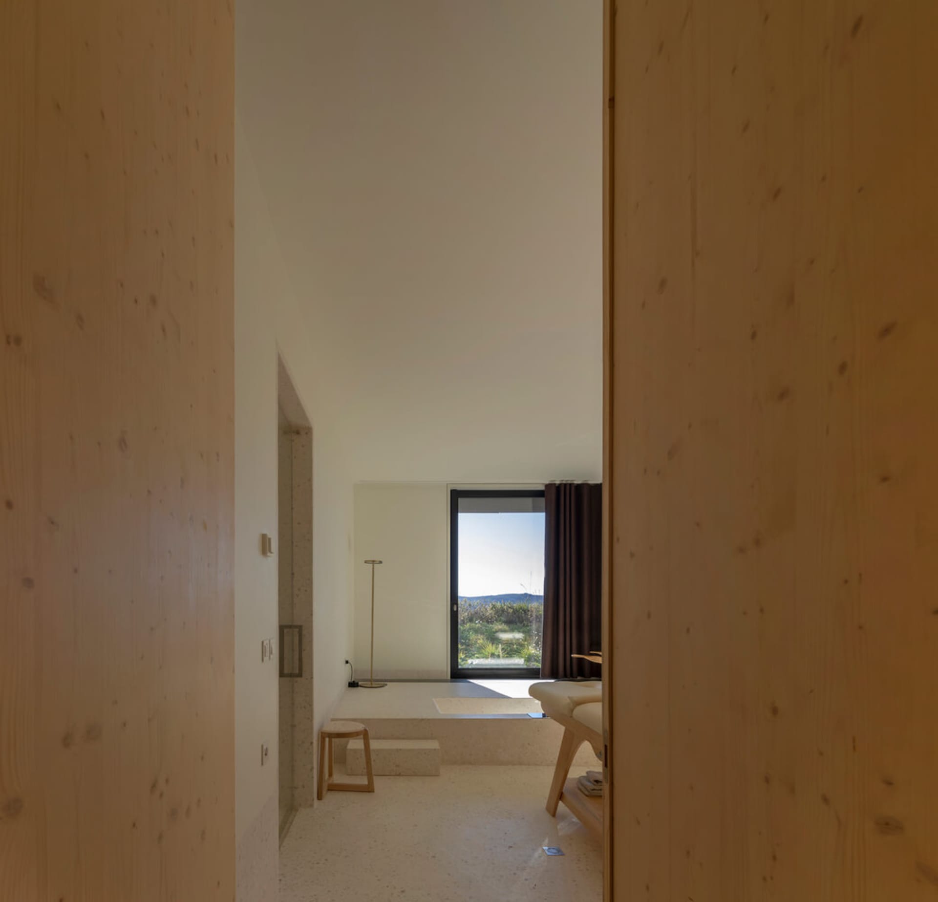 Modern minimalist residential interior with concrete and wood elements
