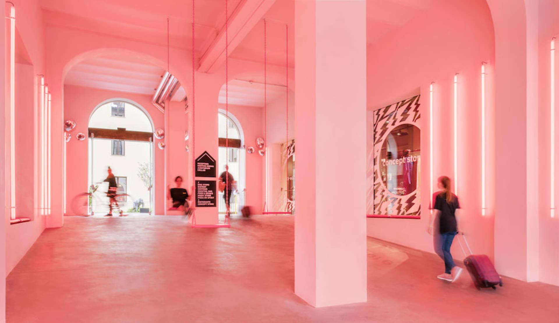 A modern retail store with concrete floors and minimalist design.