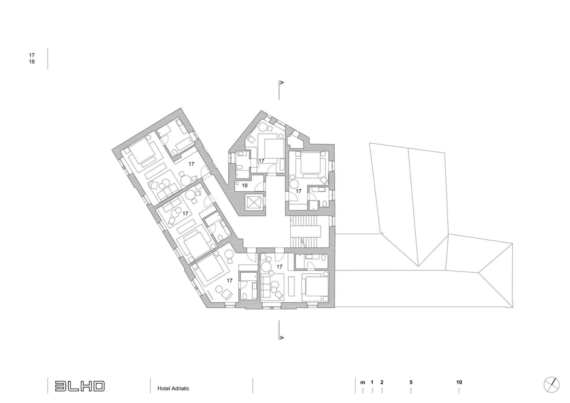 Floor plan of a hotel room layout on white background.