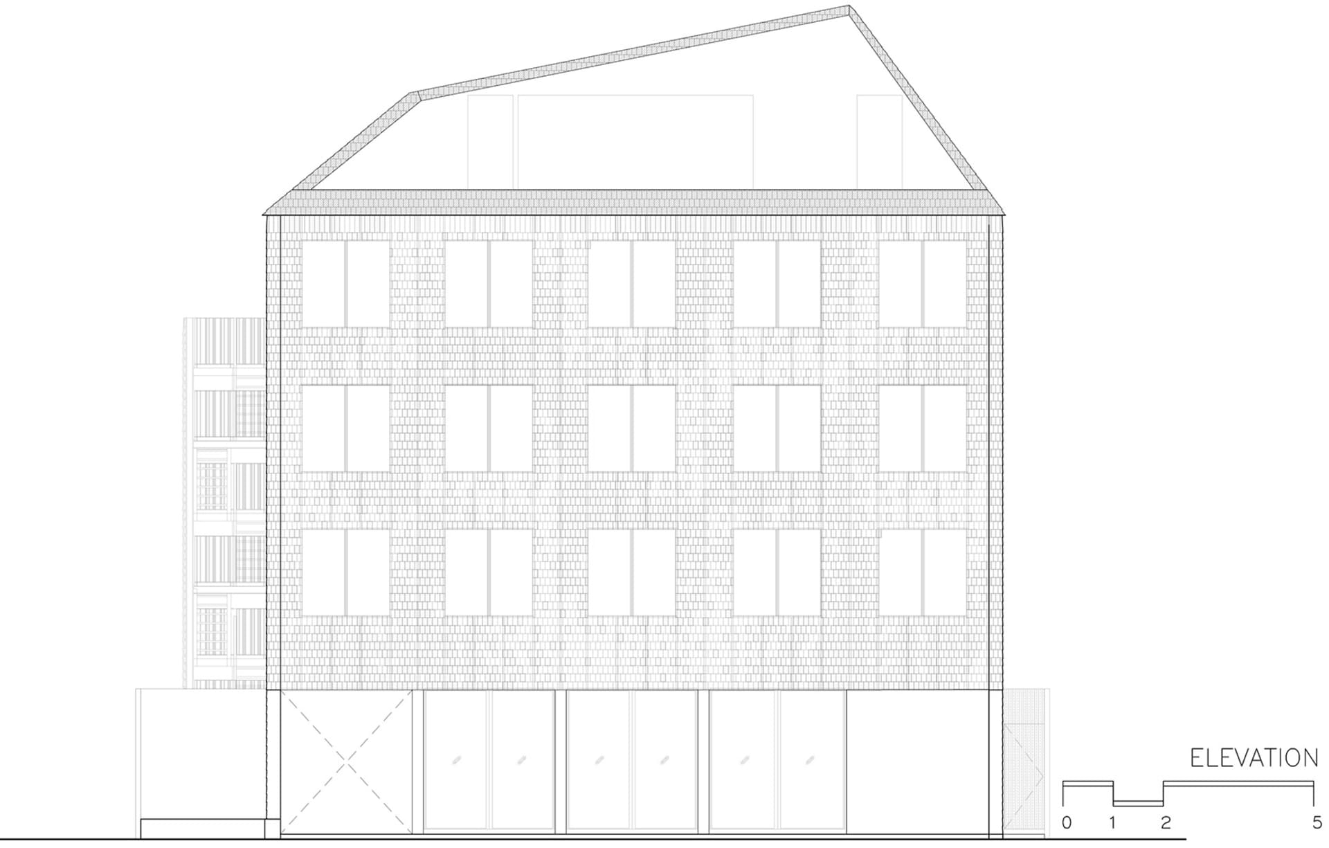 磚造建築立面圖,展示多扇窗戶與斜屋頂。