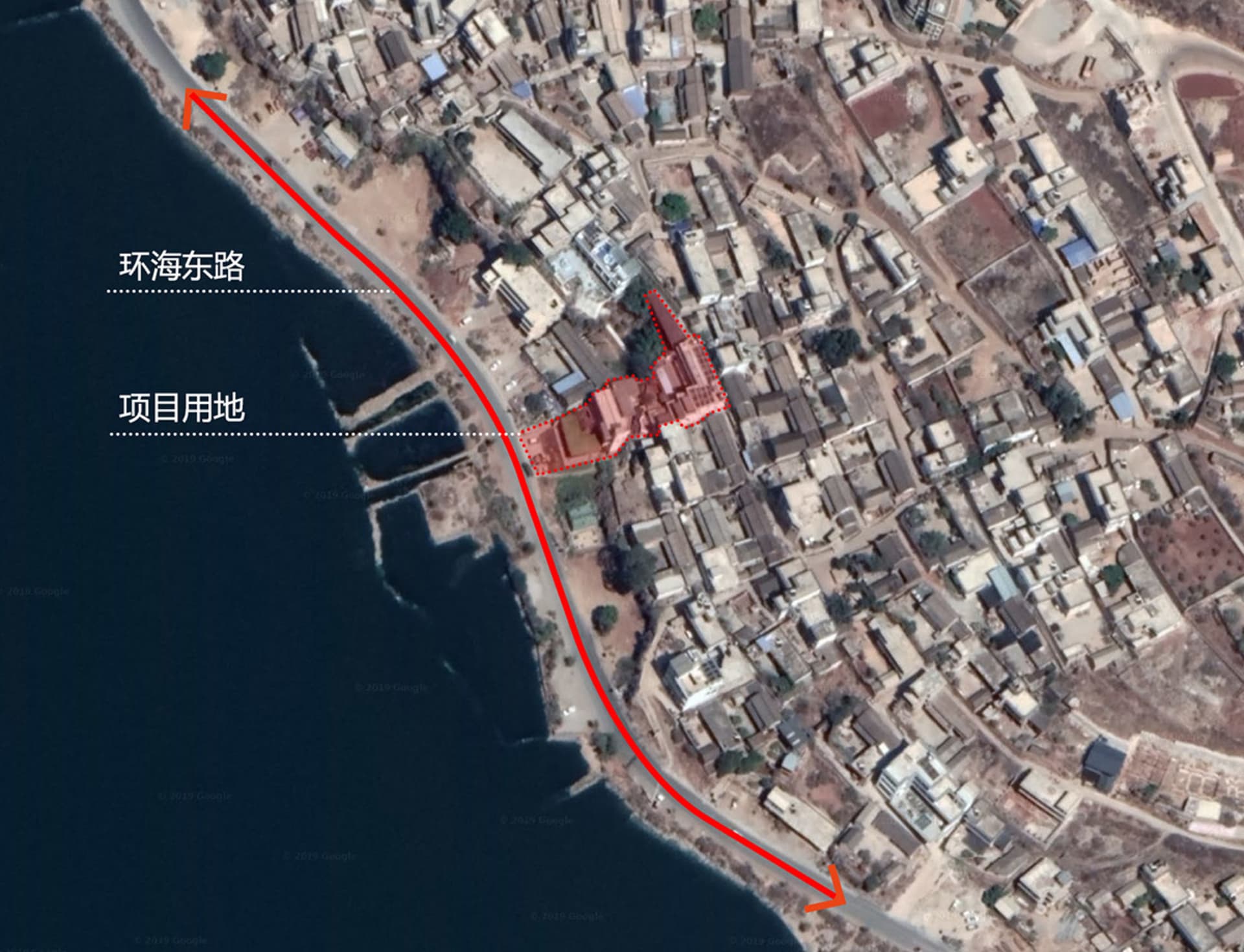 Satellite view of a city development project with highlighted boundaries and roads.