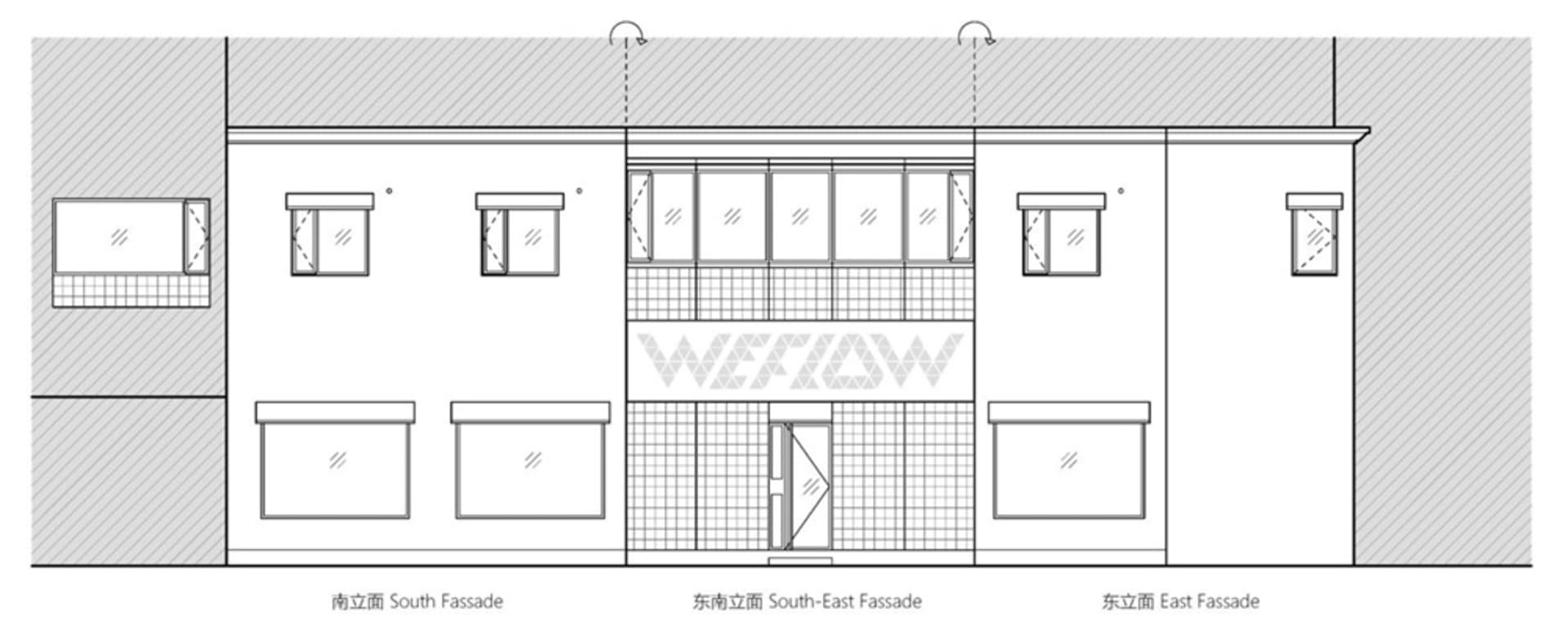 Modern retail storefront with large glass windows and concrete facade