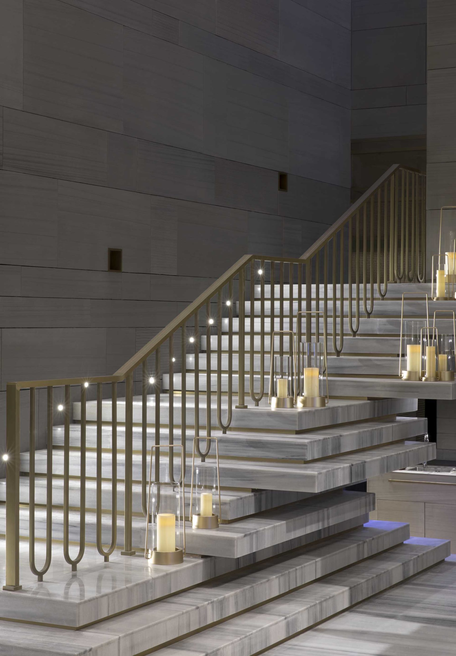 An image of a modern interior design with marble stairs.