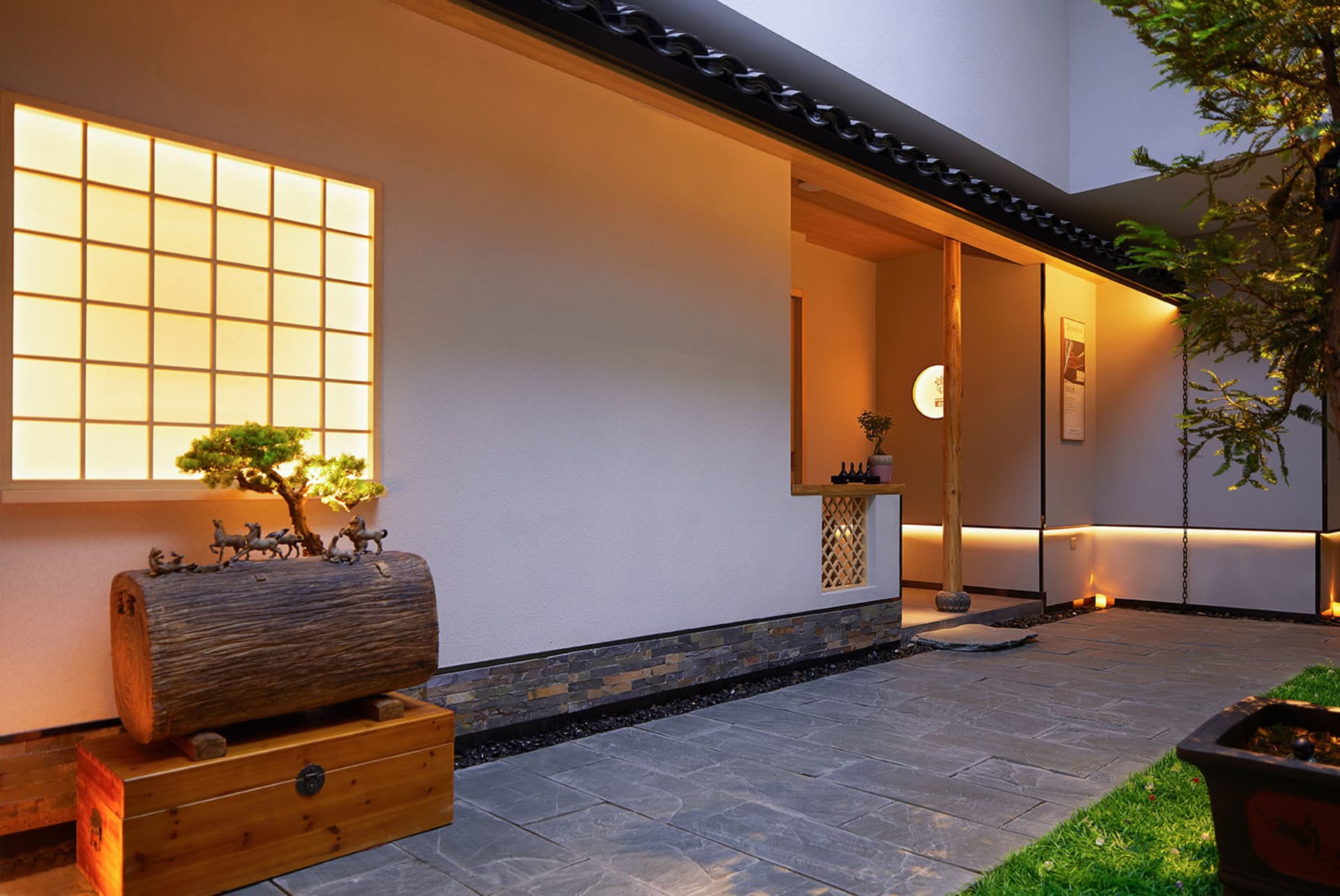 A modern residential entrance featuring wooden furniture.