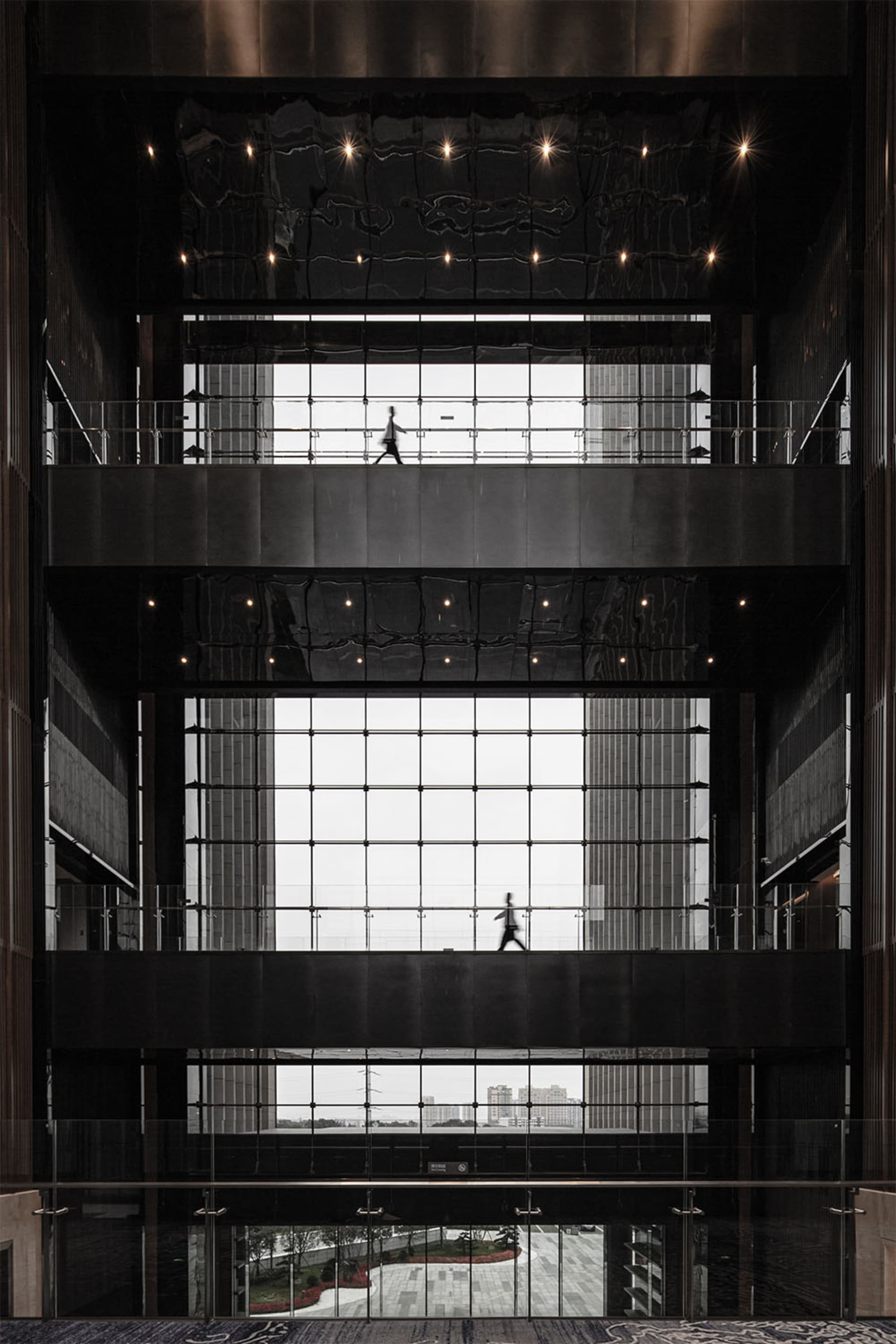 Modern building interior with glass walls and metal elements