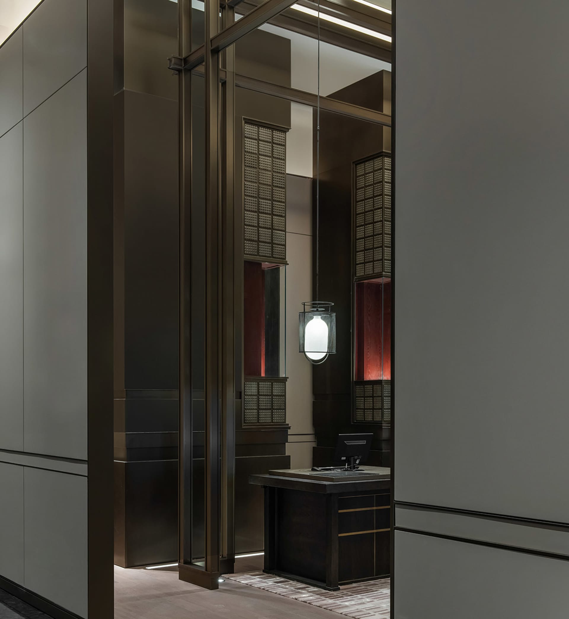 Modern lobby with glass and metal elements.