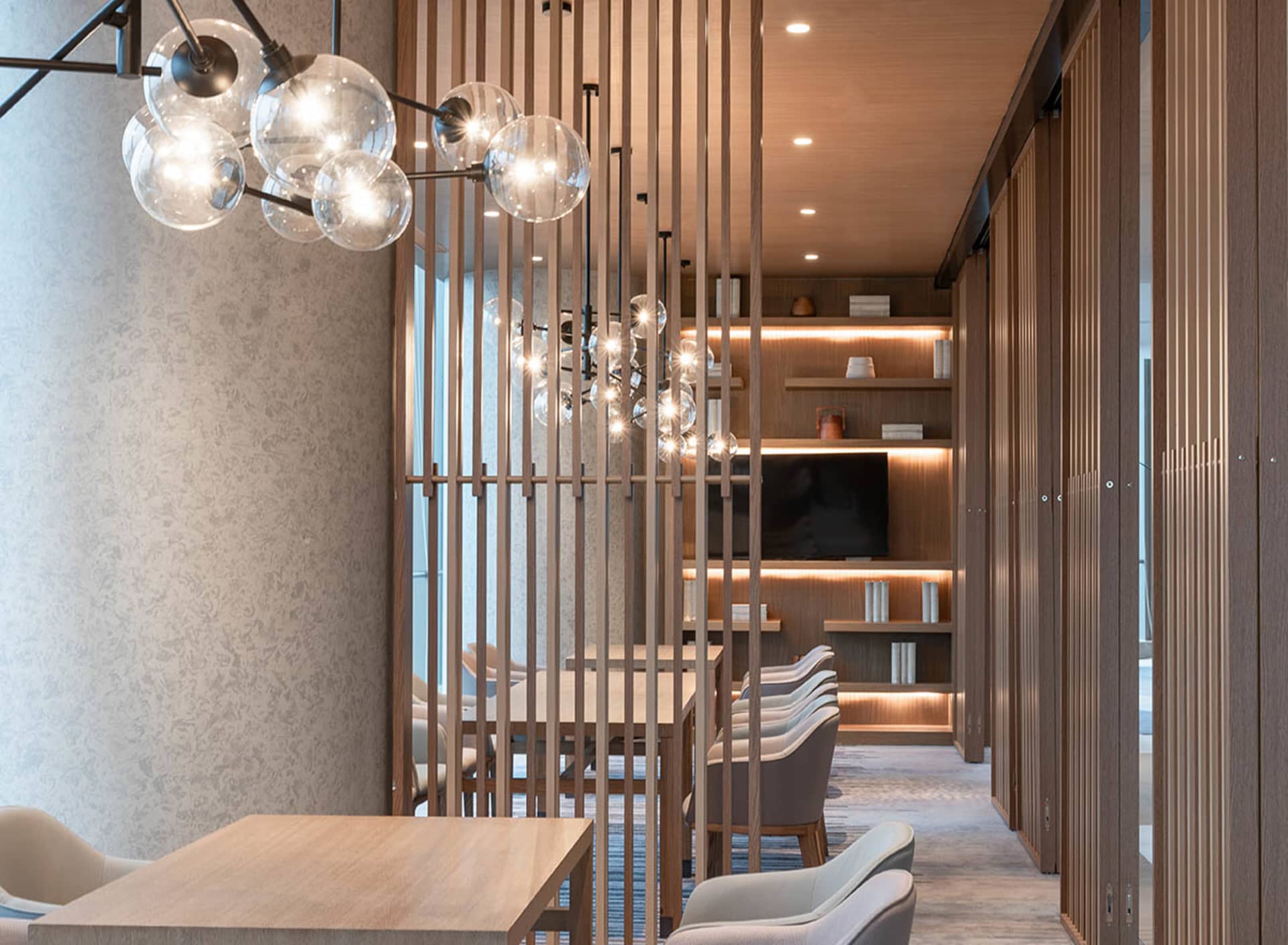 Modern office conference room featuring wood and glass elements.