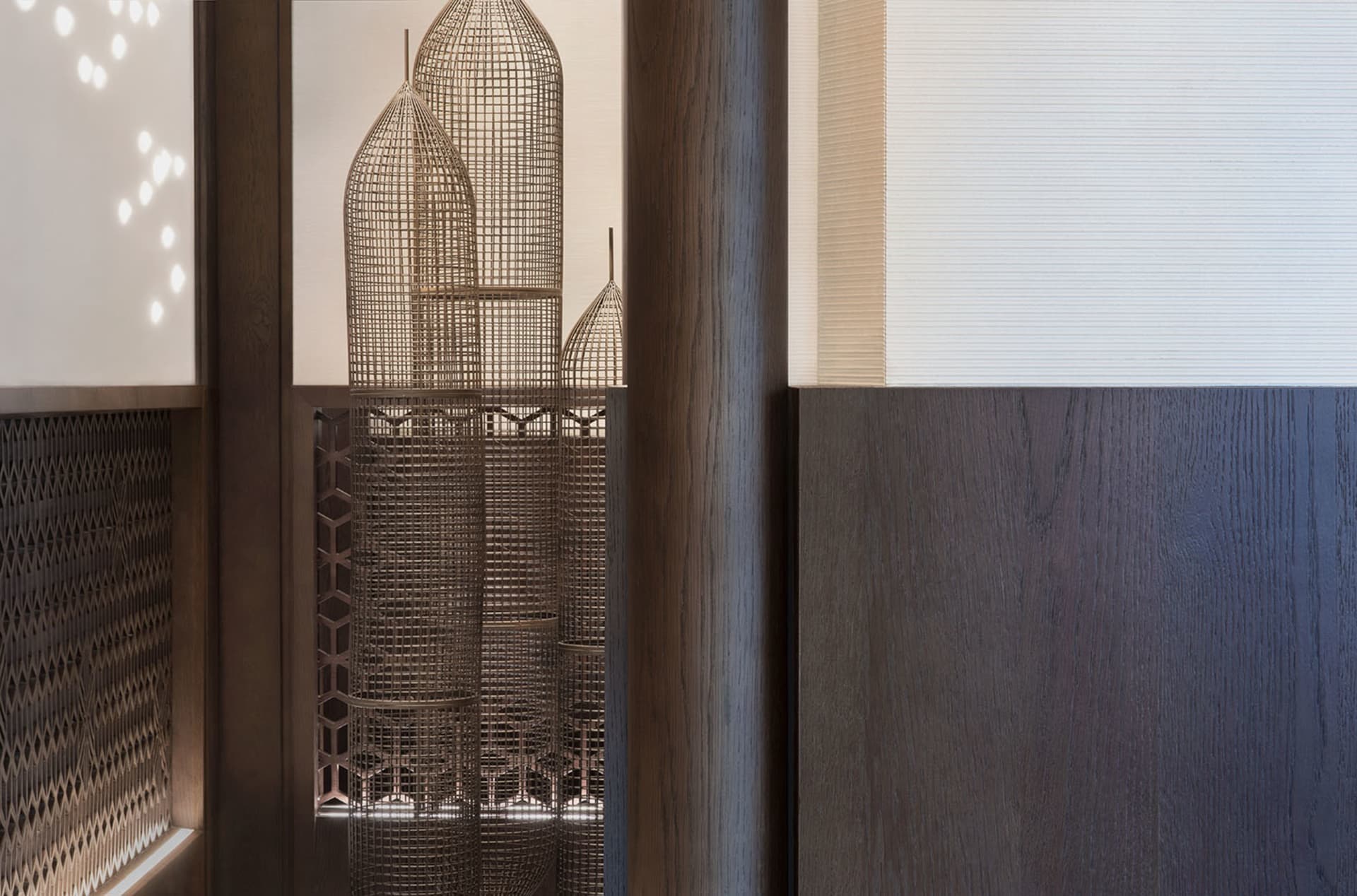 Metal wireframe sculpture in an interior design setting