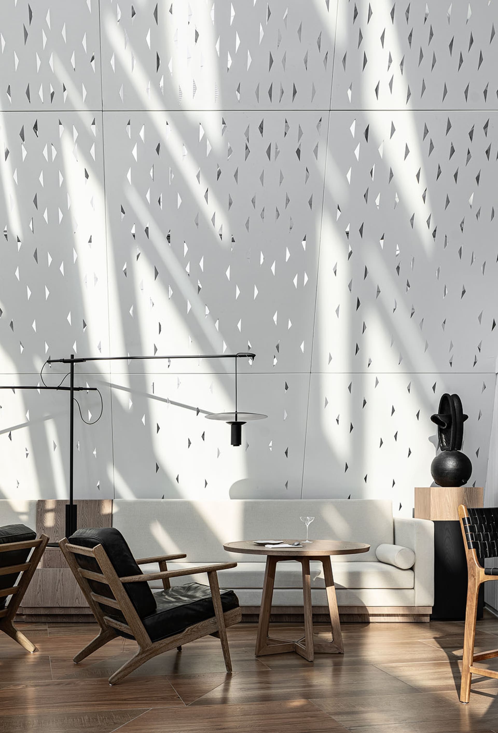 A modern retail space featuring polished concrete flooring and minimalist design.