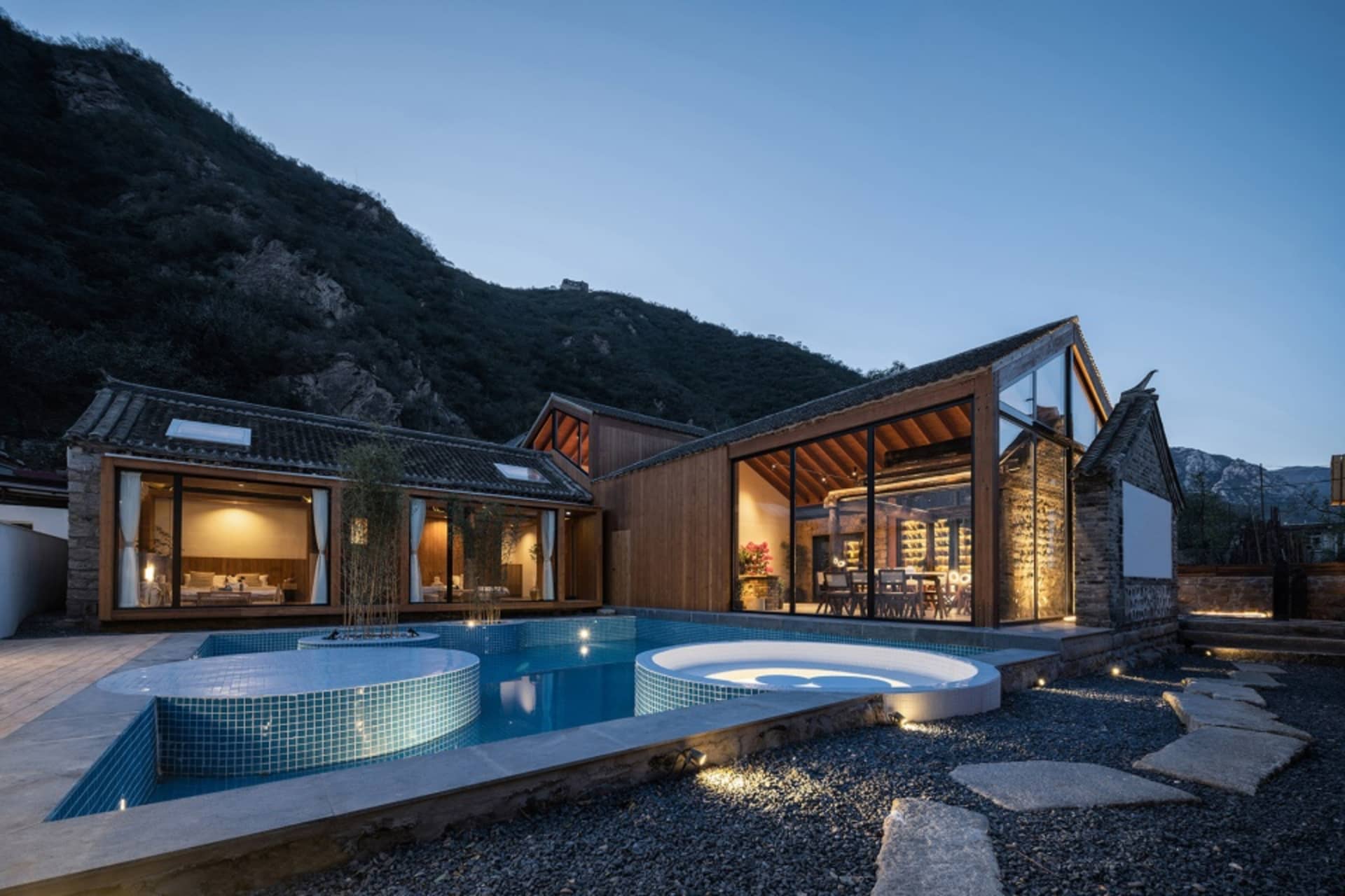 Modern residential house with a pool and wooden exterior