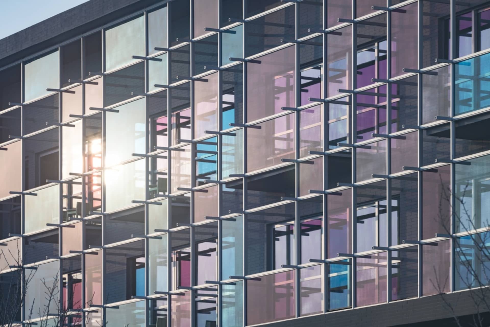 A modern glass office building with a contemporary design.