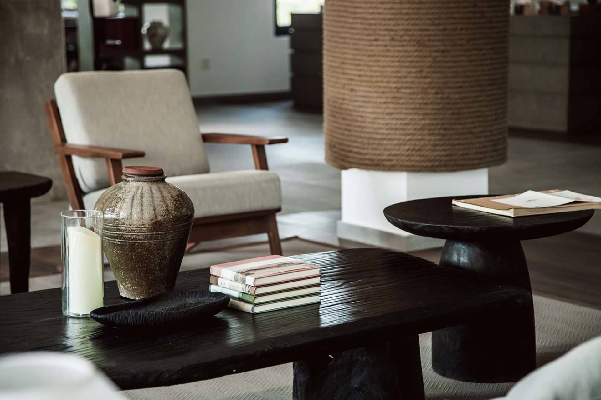 A modern industrial interior with wood furniture and minimalist design.