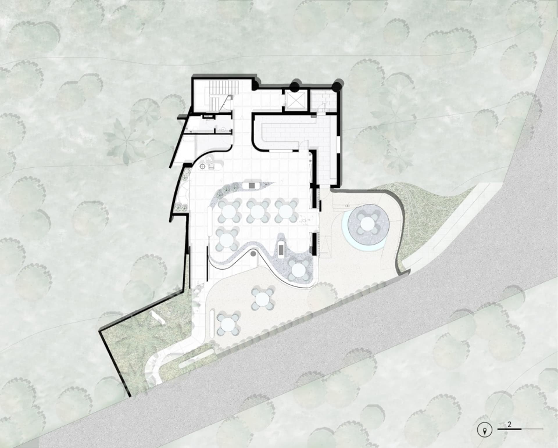 An overhead view of an indoor architectural space with tables and chairs.