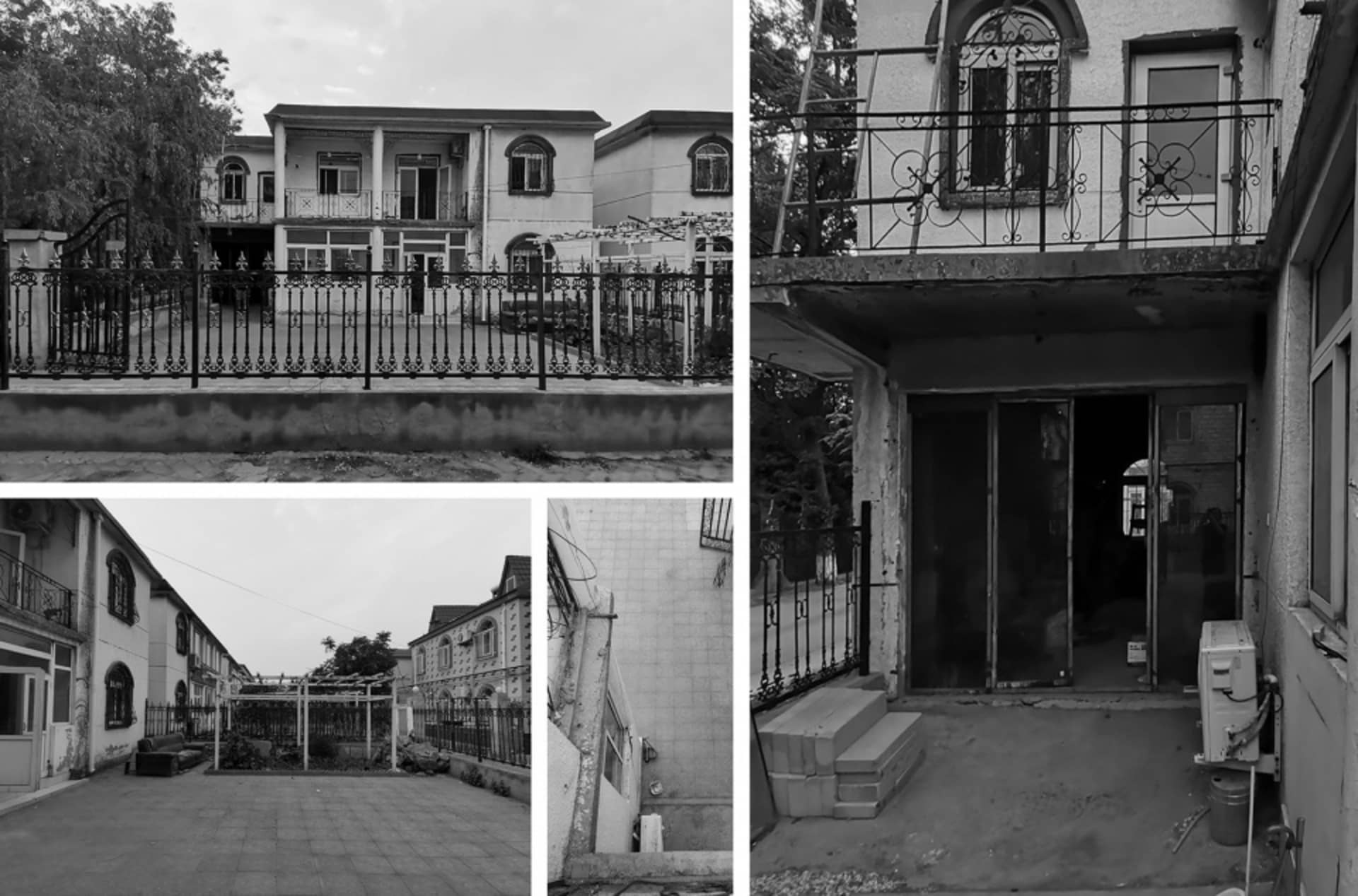 Modern suburban homes with concrete exteriors and iron railings.
