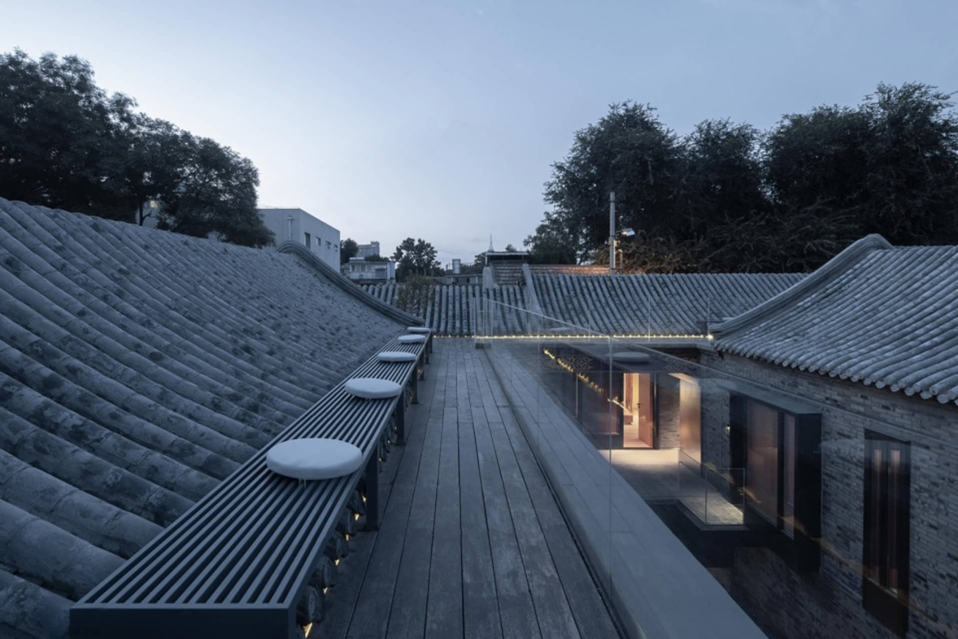 Modern rooftop designed with concrete beams and a tile roofing system.