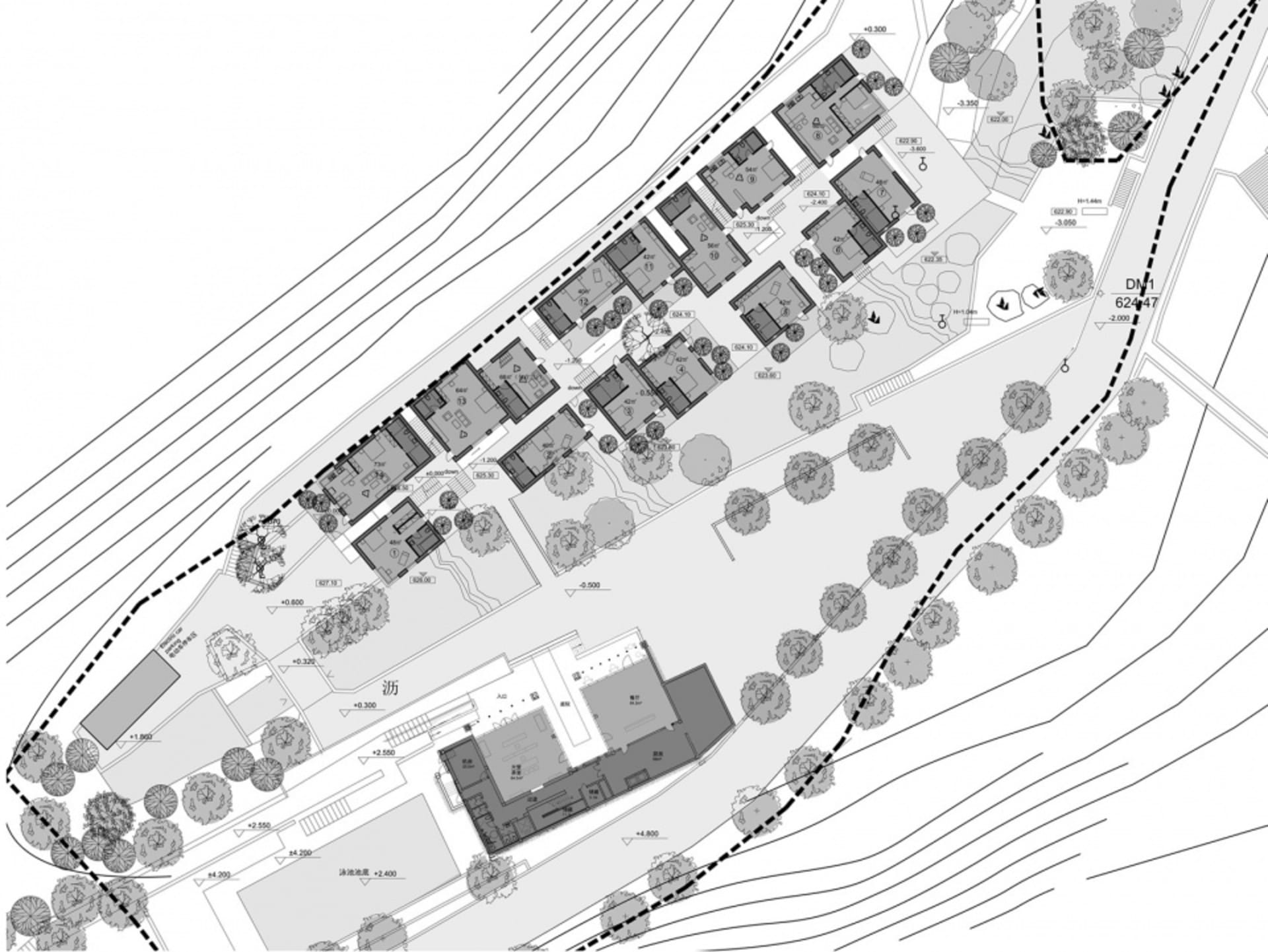 Detailed architectural blueprint of a modern residential property with multiple buildings and landscaping.