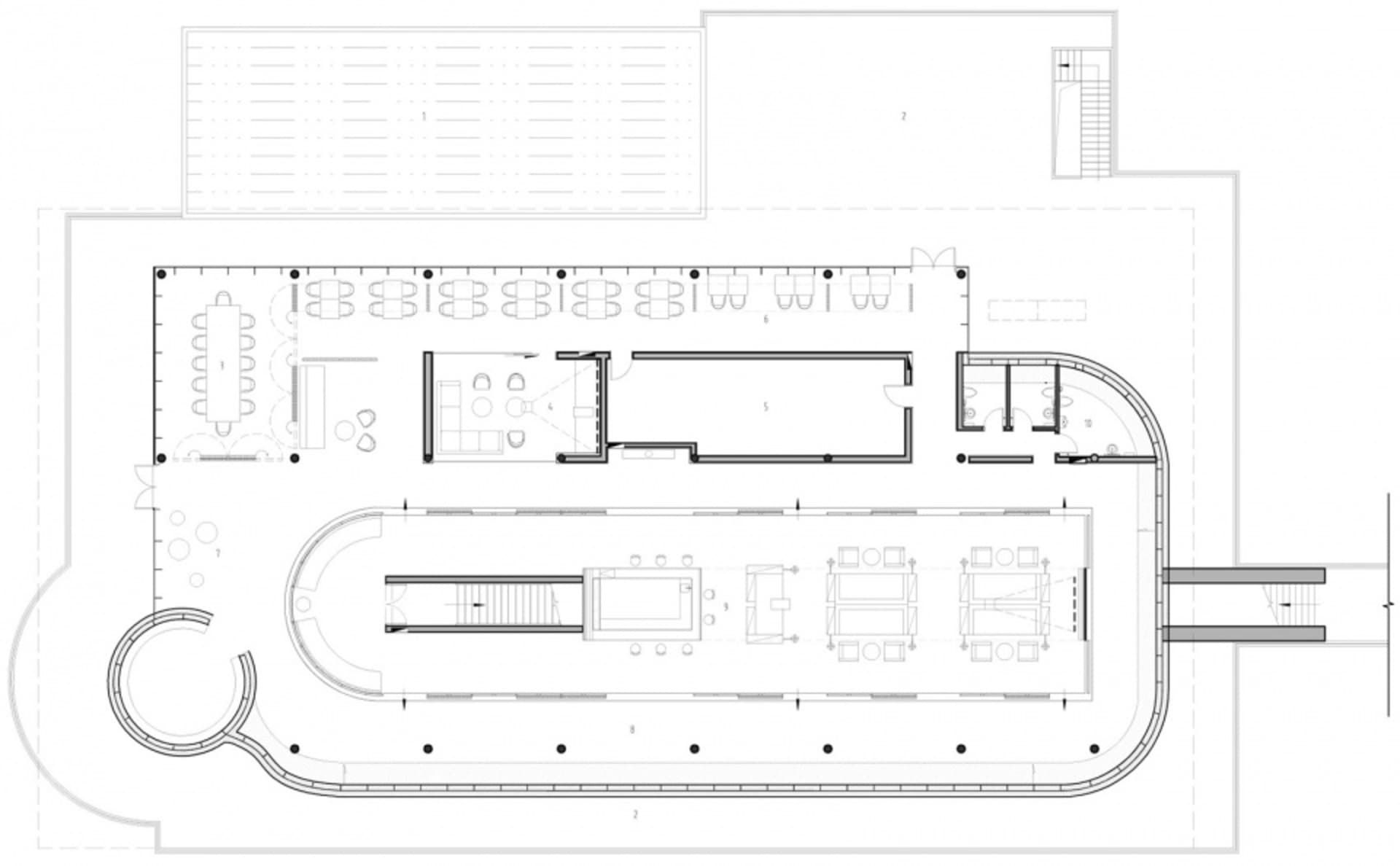 Modern office conference room floor plan displaying various functional zones and design features.