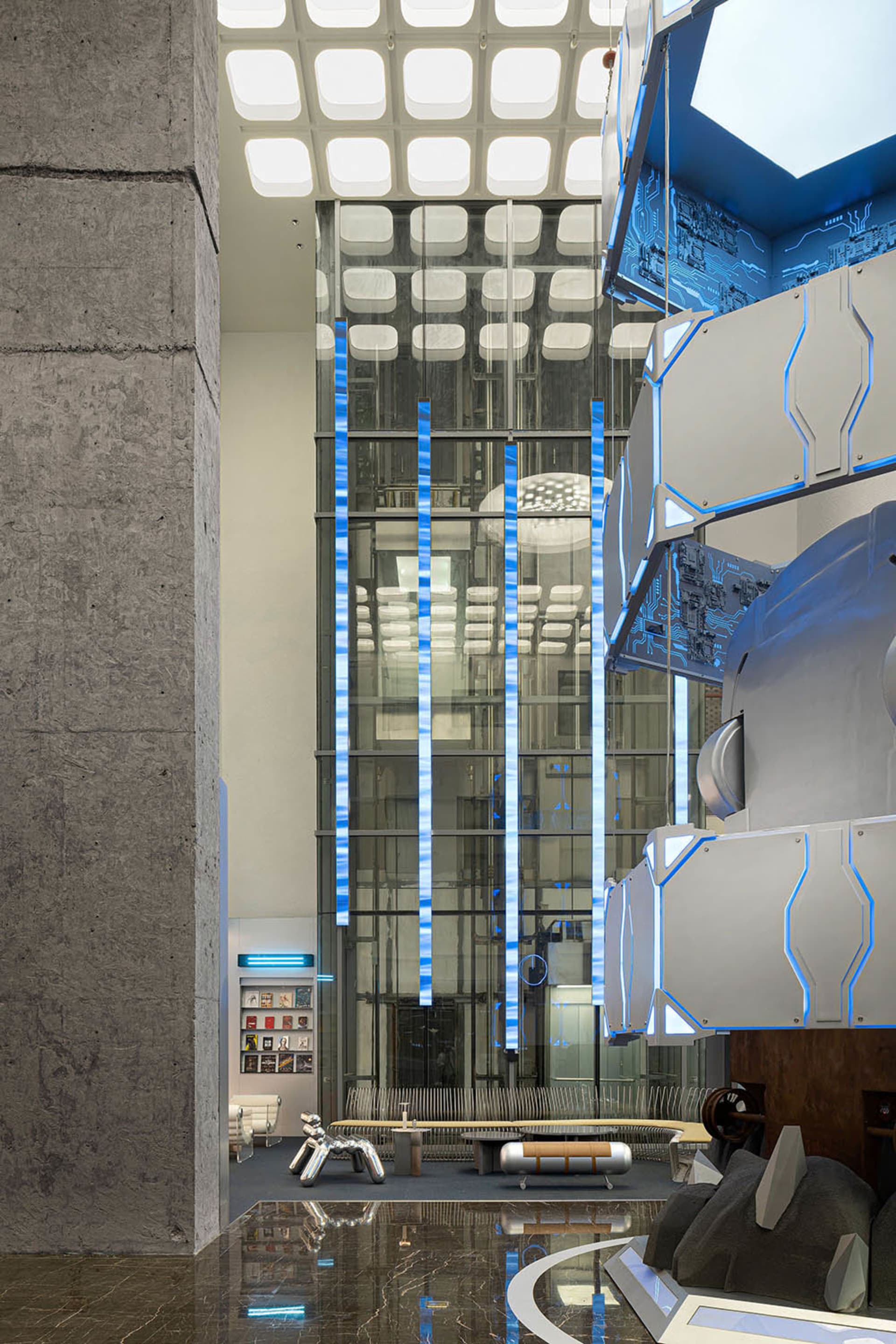 Modern industrial design lobby with metallic and glass elements