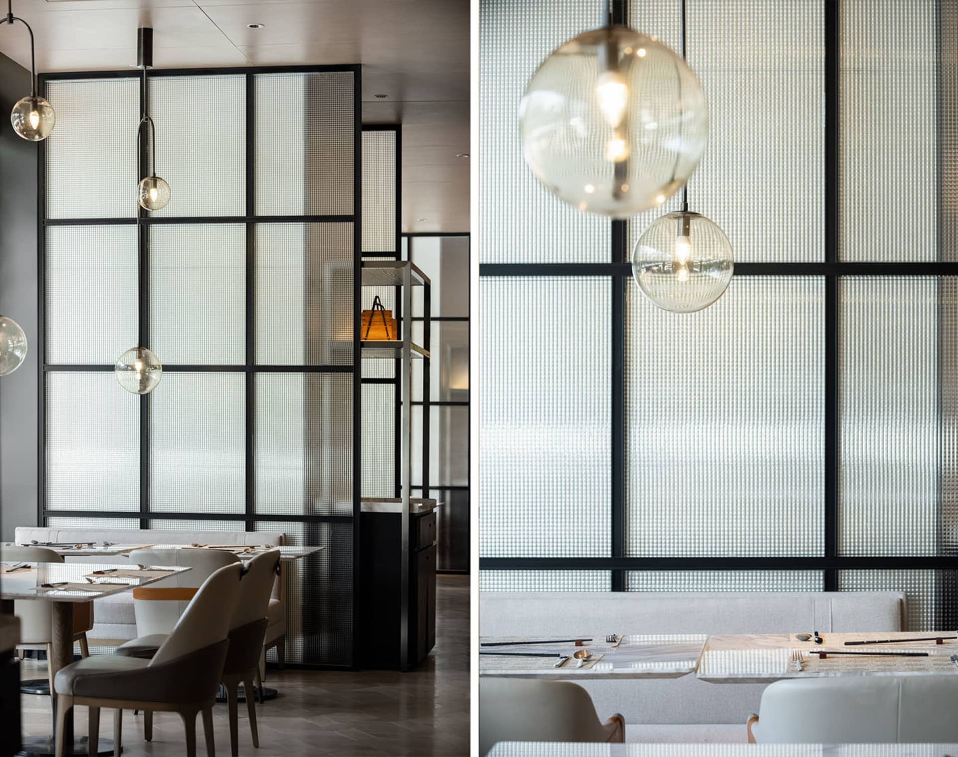 Modern restaurant with a glass wall and white seating.