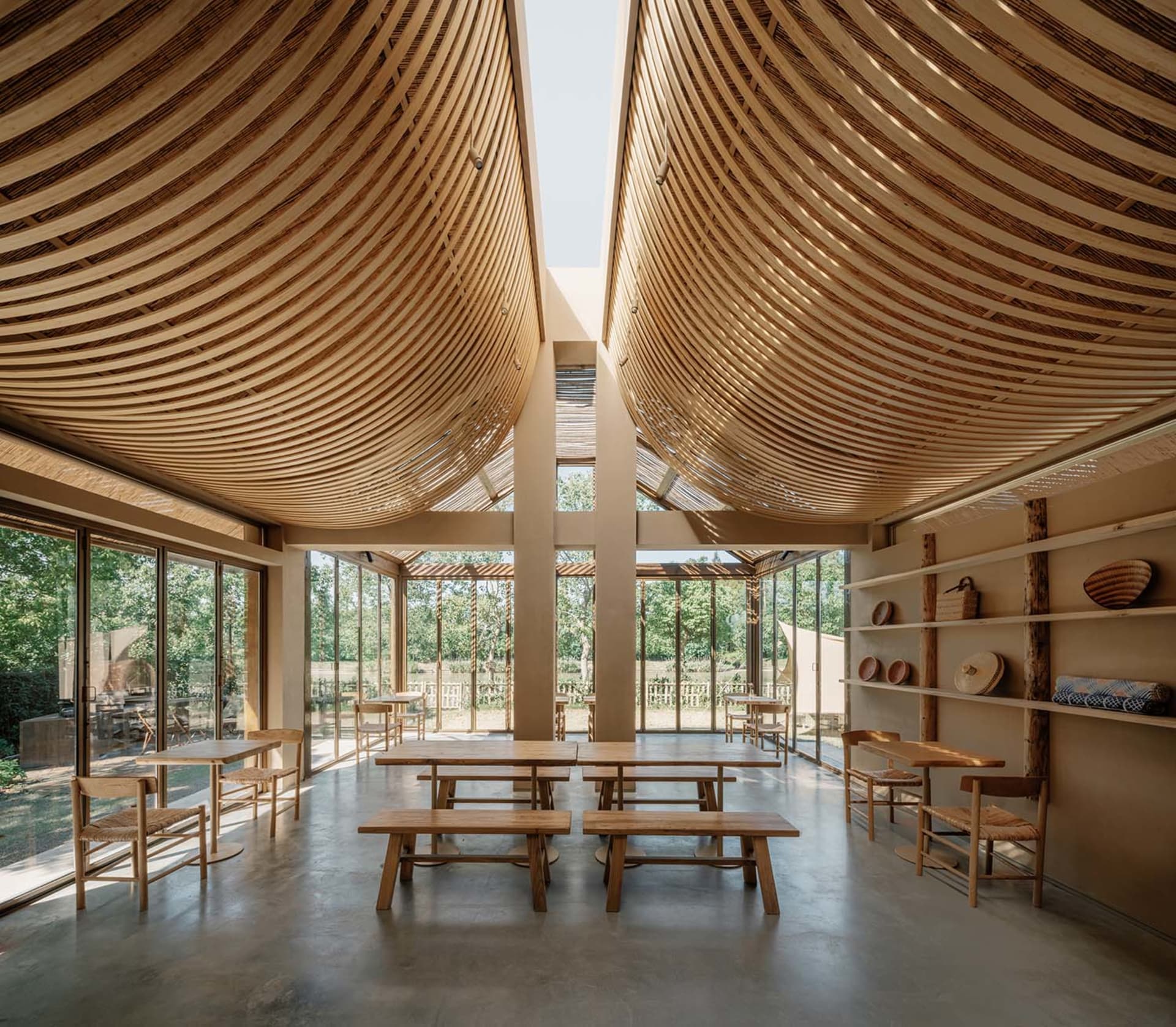 A minimalist restaurant interior featuring wood as the main material.