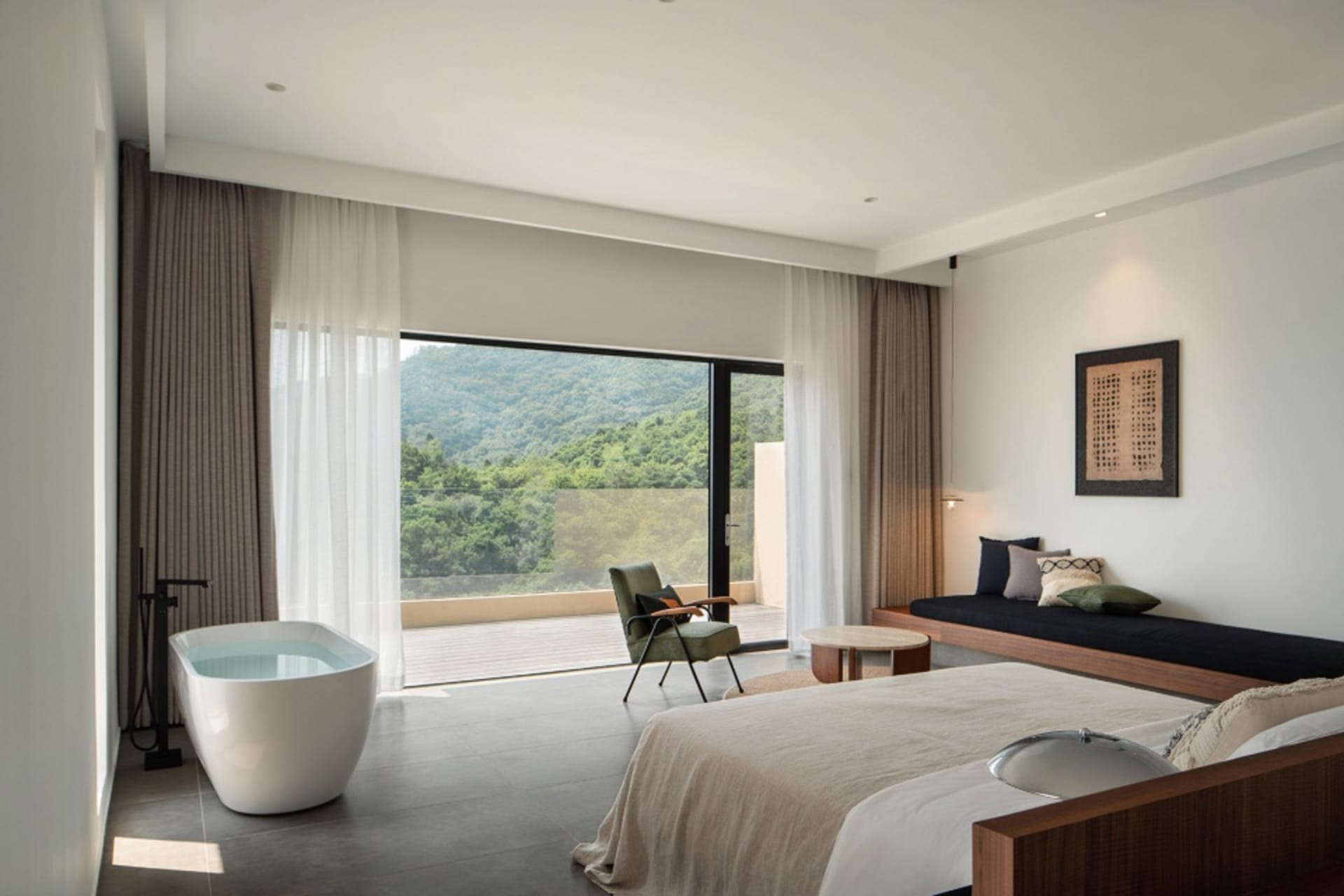 Modern bedroom featuring a wooden bed and minimalist decor.